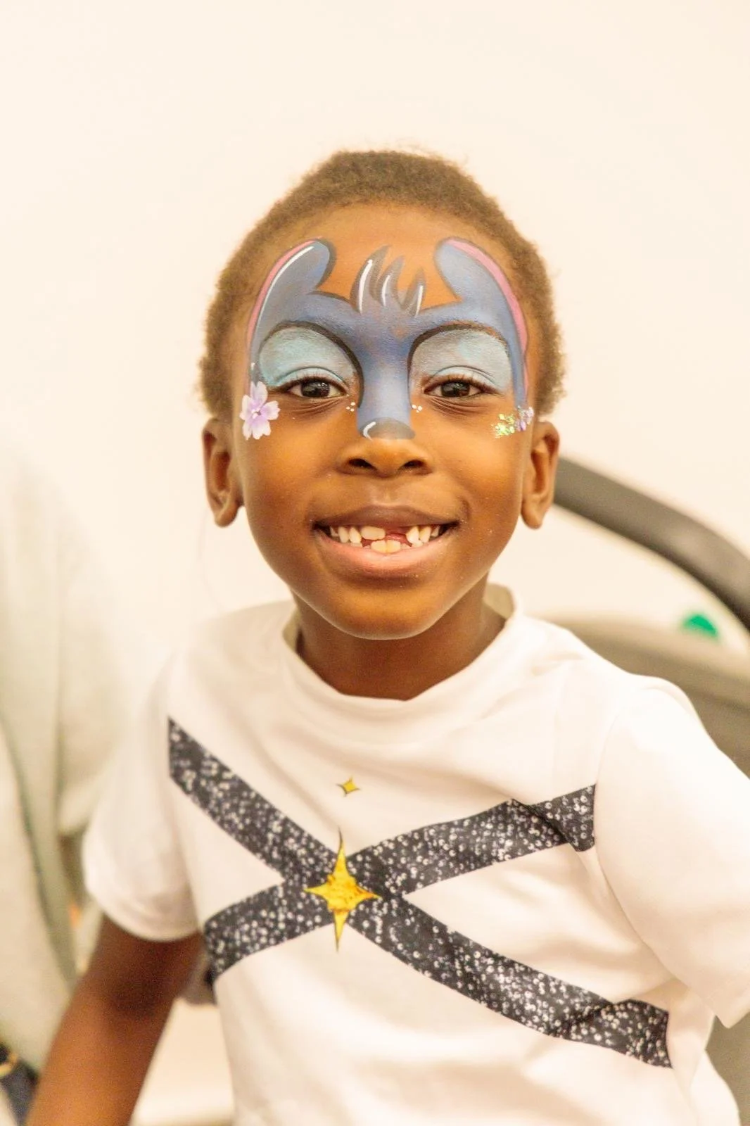 Children’s Party Face Painting Epsom – vibrant butterfly and tiger designs for kids’ birthdays.