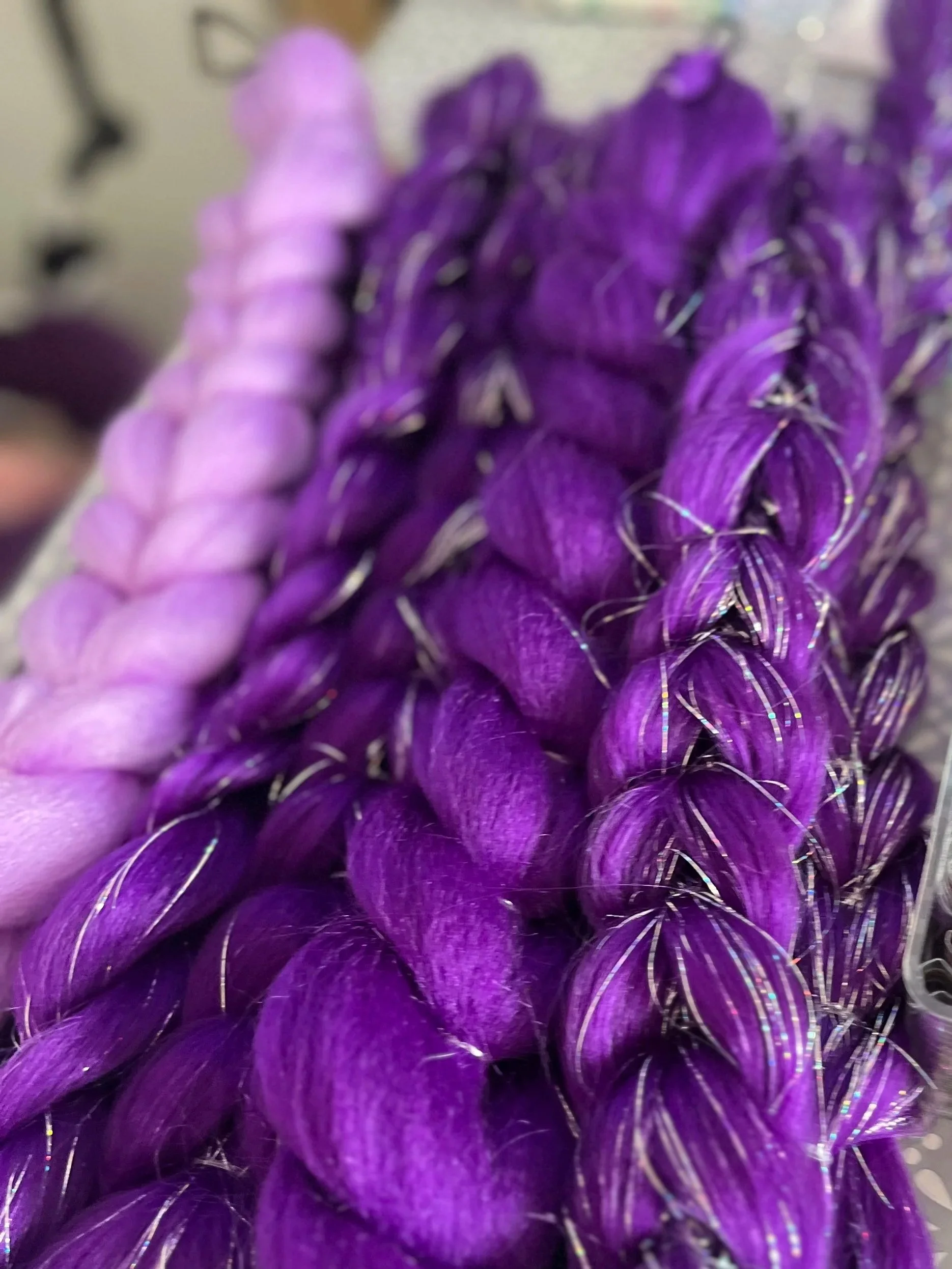 Festival-style bubble braids at a braid bar in Central London