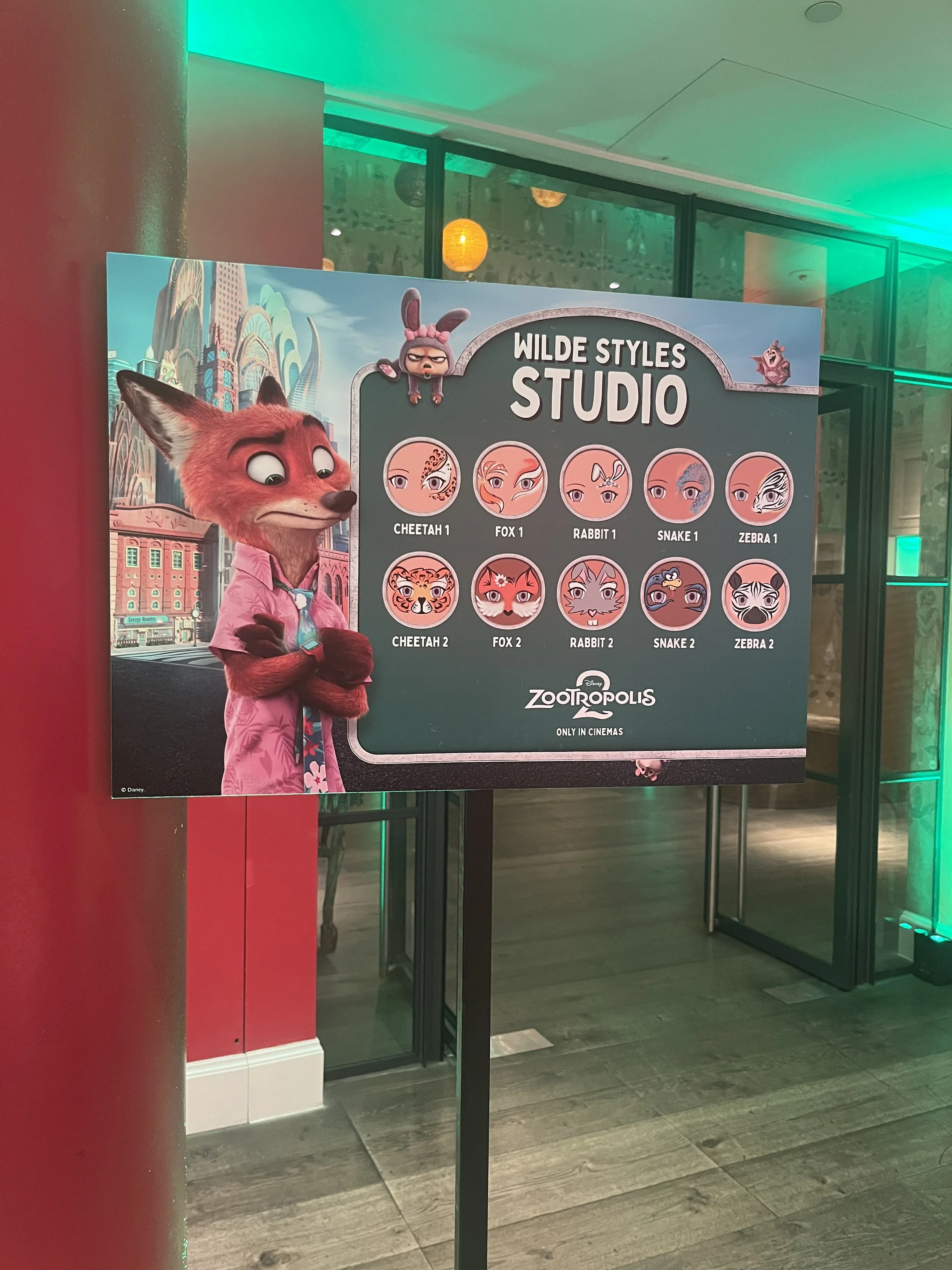 "Bespoke face painting design board created to match brand theme"