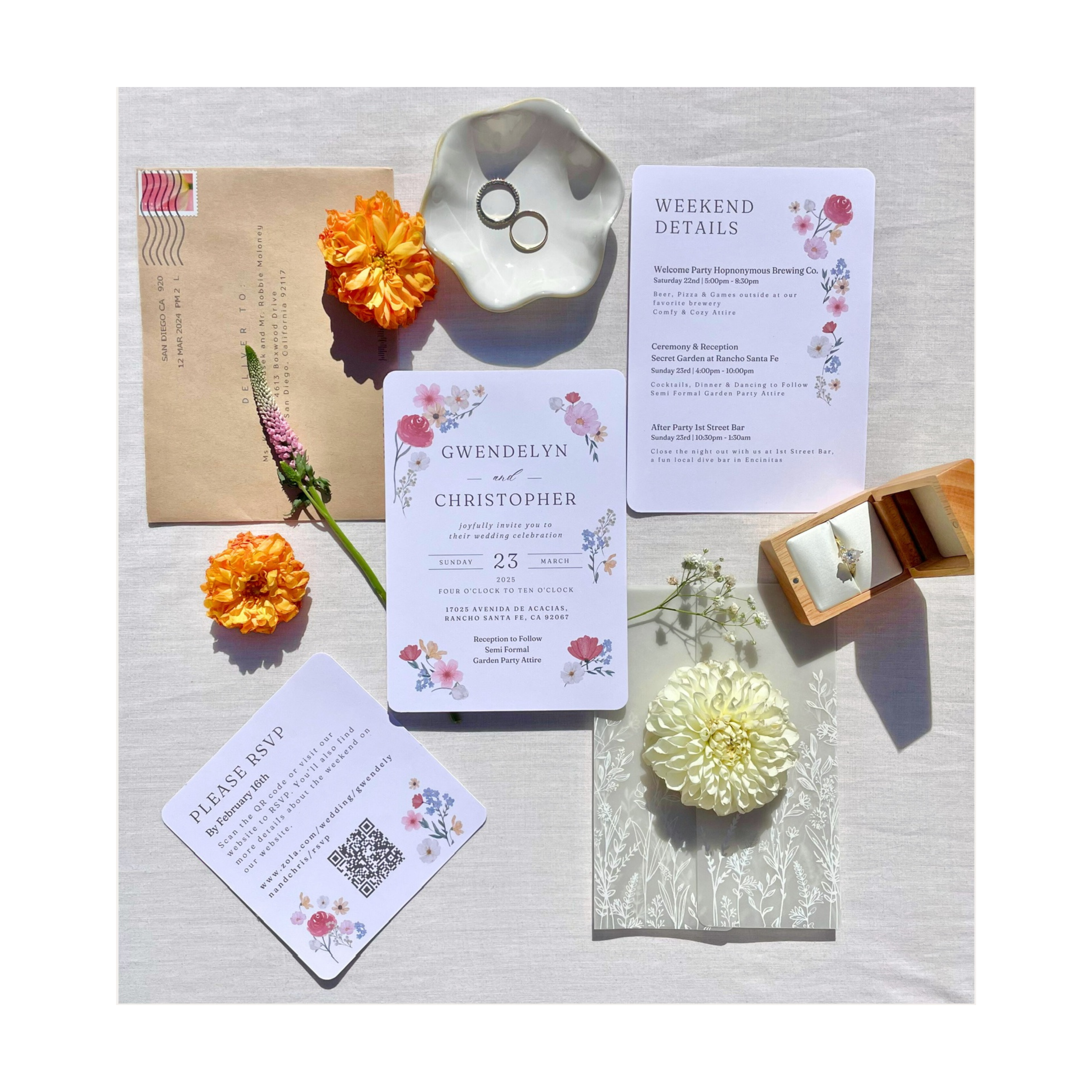 Wedding invitation suite with floral design and event details.