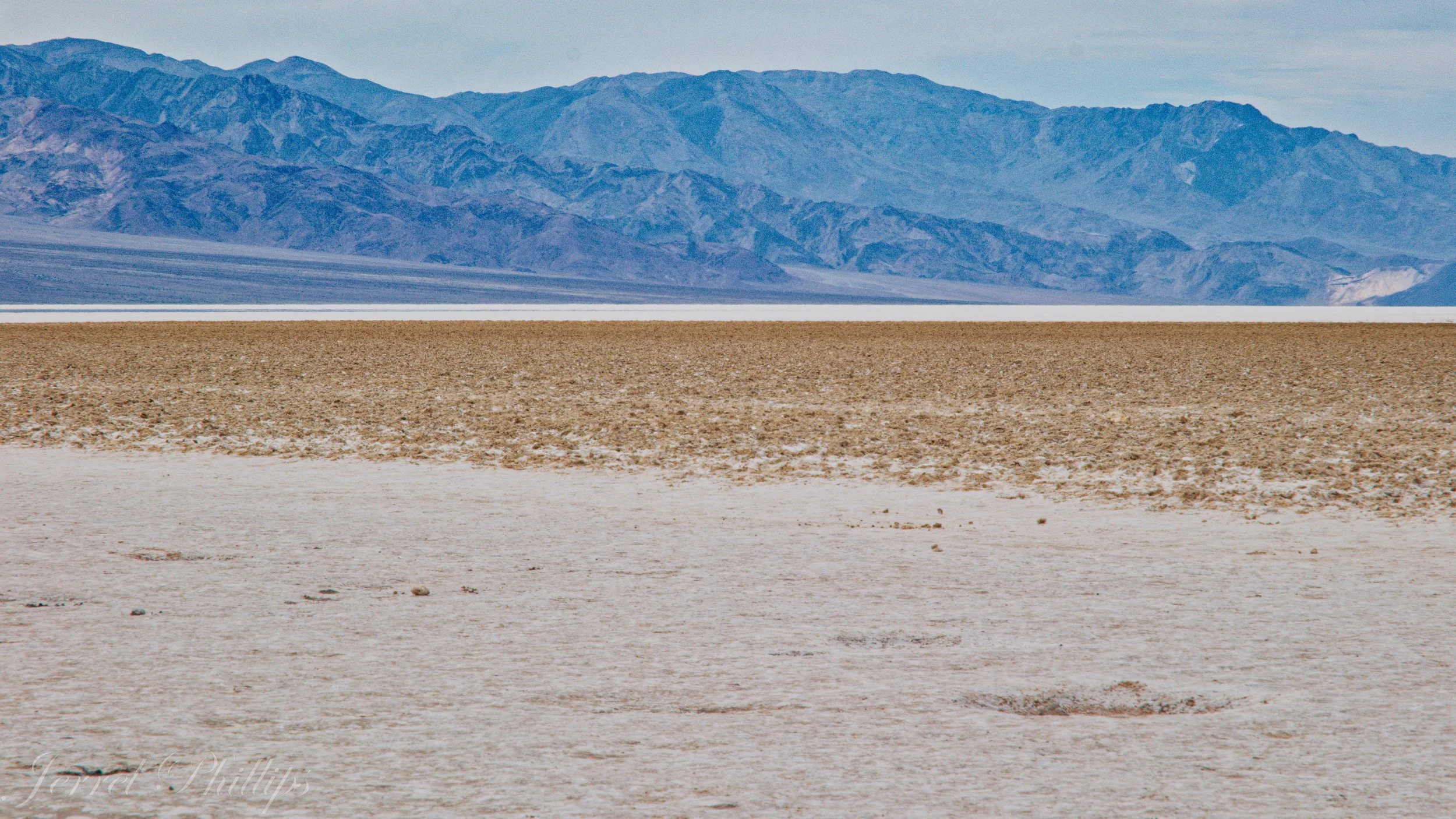 Badwater Basin (Elev 282 ft & Lowest Elevation in North America) looking towards Dantes View (Elev 5475 ft)--Death Valley National Park