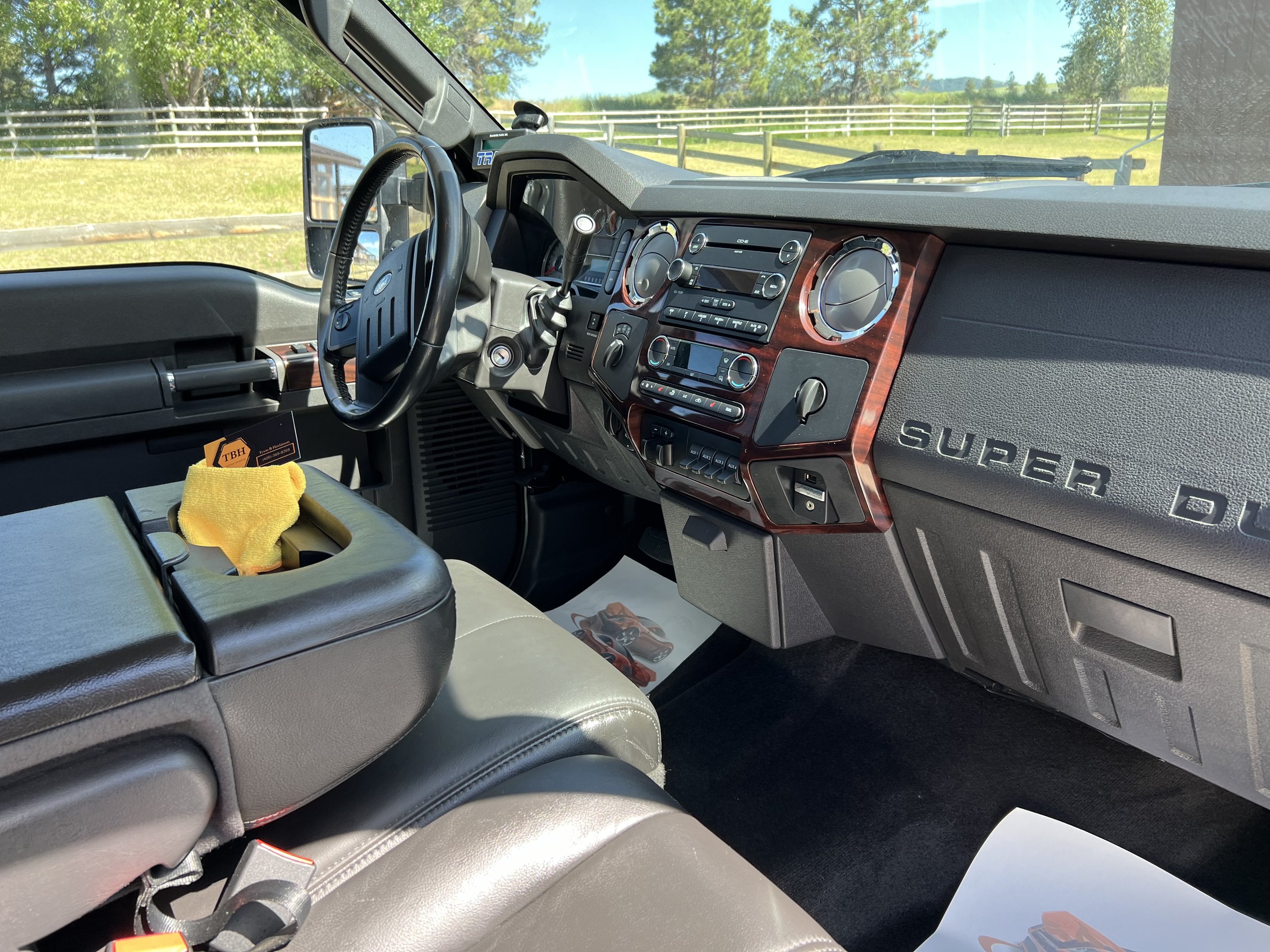 Interior of a Ford Super Duty truck showing dashboard and steering wheel