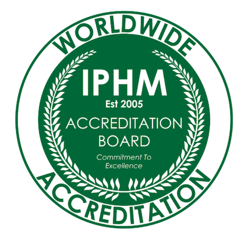Green and white circular badge for IPHM accreditation, established 2005, with the words 'Worldwide Accreditation' and 'Commitment to Excellence'.