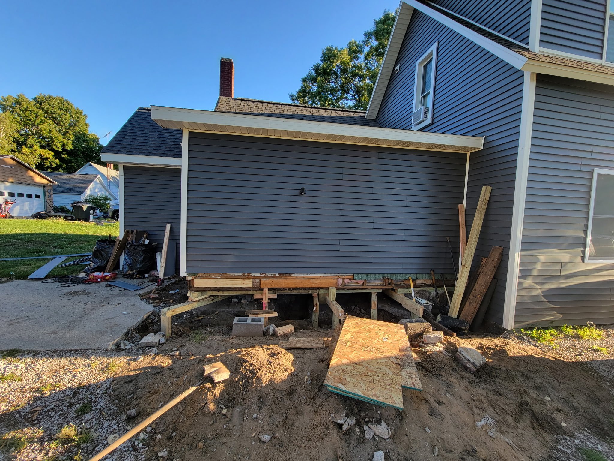 Excavating and installing supports.