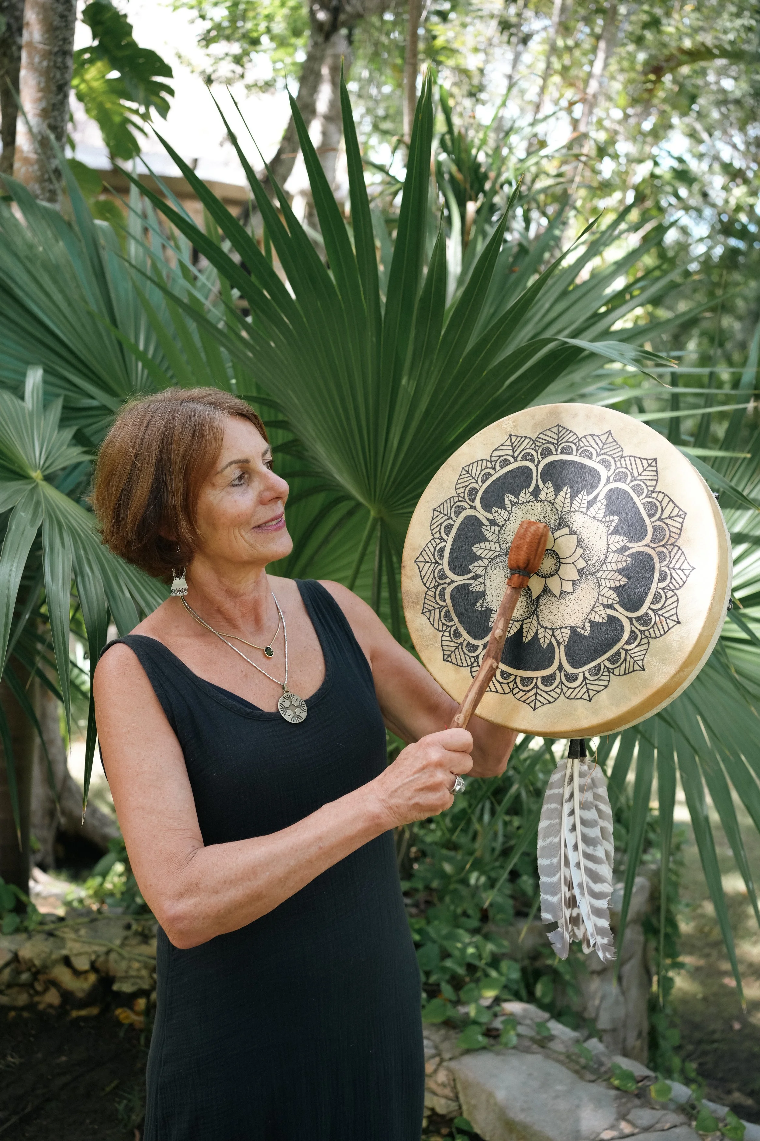 Brigitte playing shamanic drum in Mexico