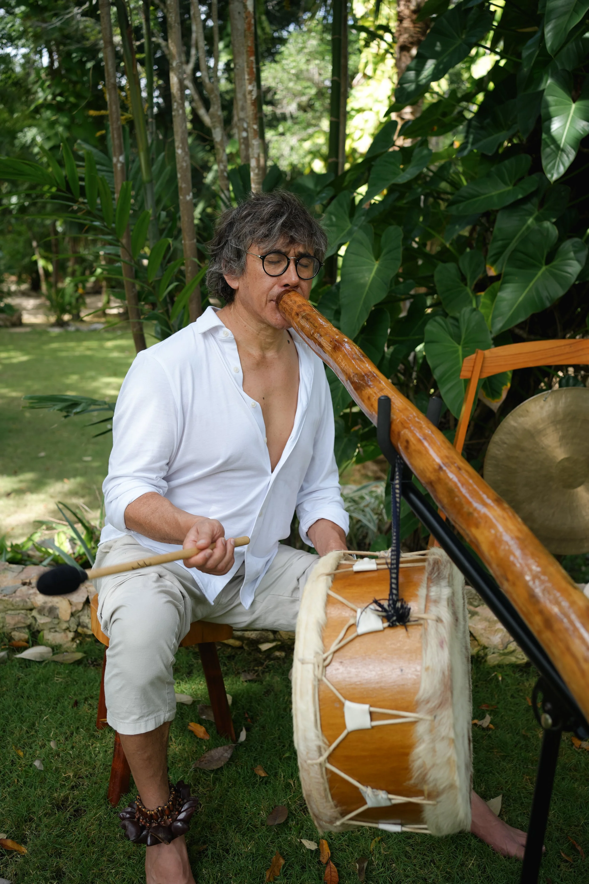 Jose Luis playing didgeridoo and drum