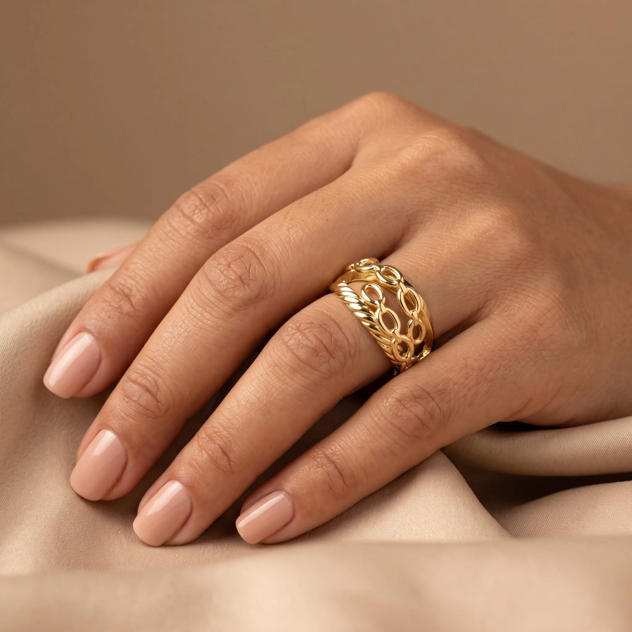 Firefly_Gemini Flash_Close-up of a woman's hand wearing an 18K yellow gold openwork band ring of refined,  666066.jpg (Copy)