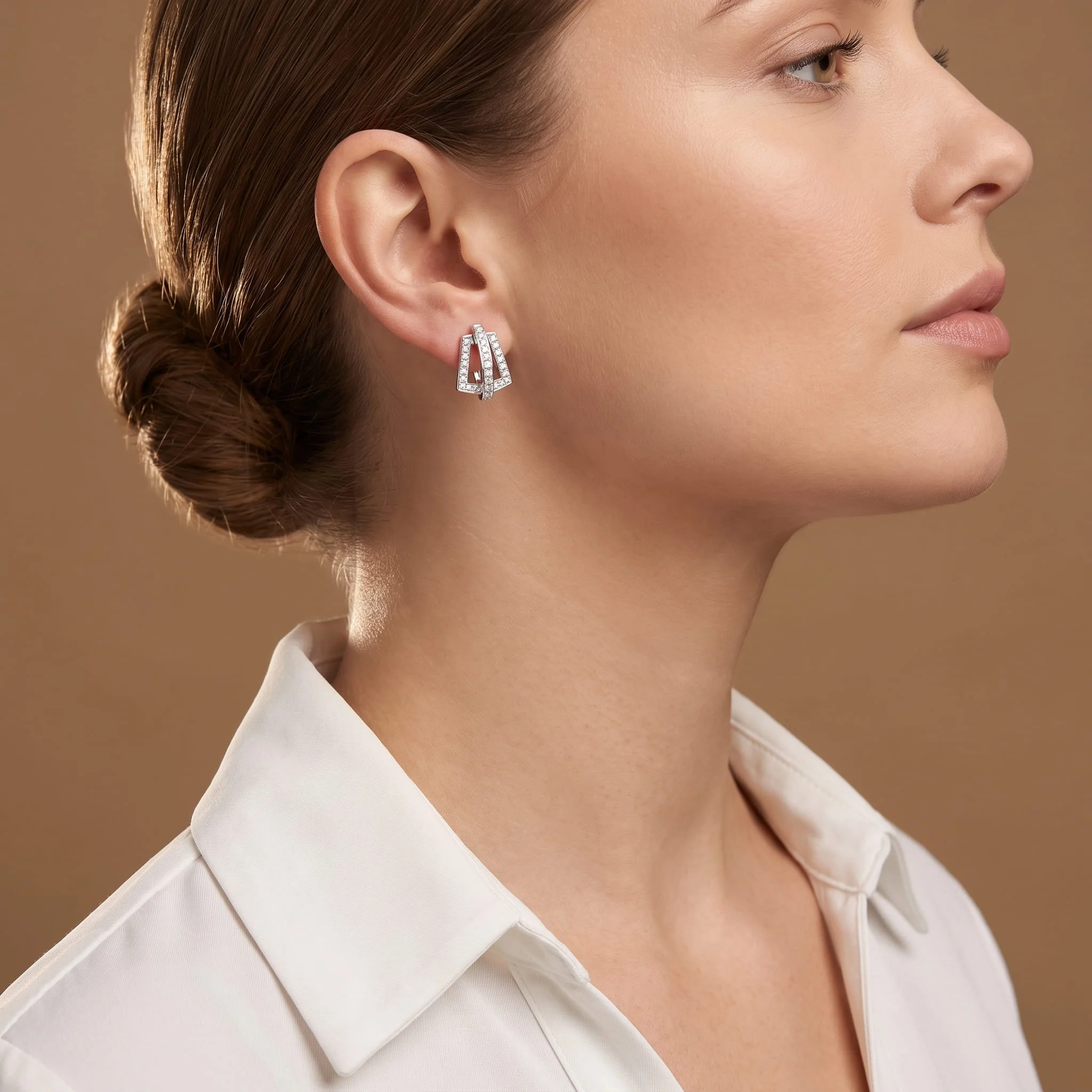 Firefly_Gemini Flash_A white-gold diamond triple-row huggie earring, a short curved cuff that hugs the low 113702.jpg (Copy)