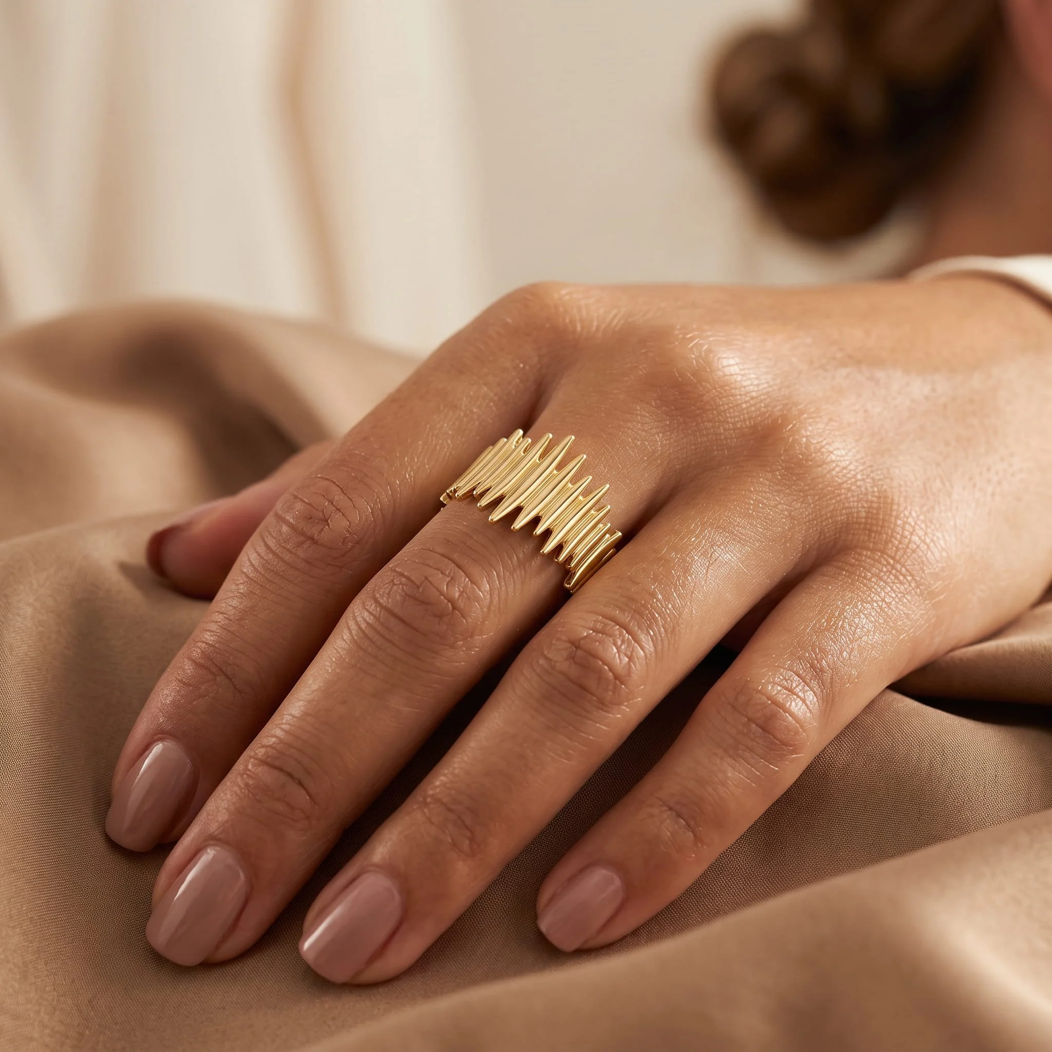 Firefly_Gemini Flash_A polished yellow-gold sculptural band built from a tightly packed row of slim vertic 81538.jpg (Copy)