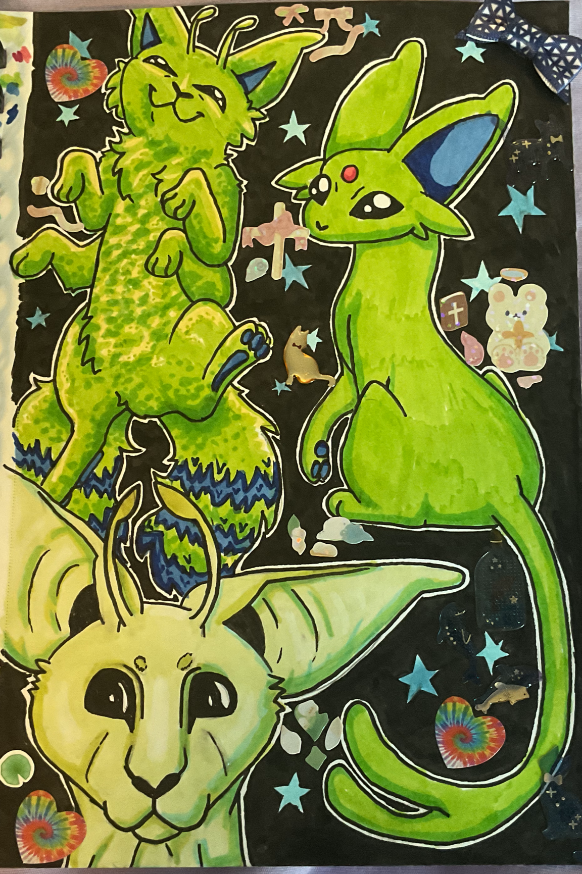 Just a bunch of alien kitties dude. Made in a sketchbook with a lot of mixed media elements.