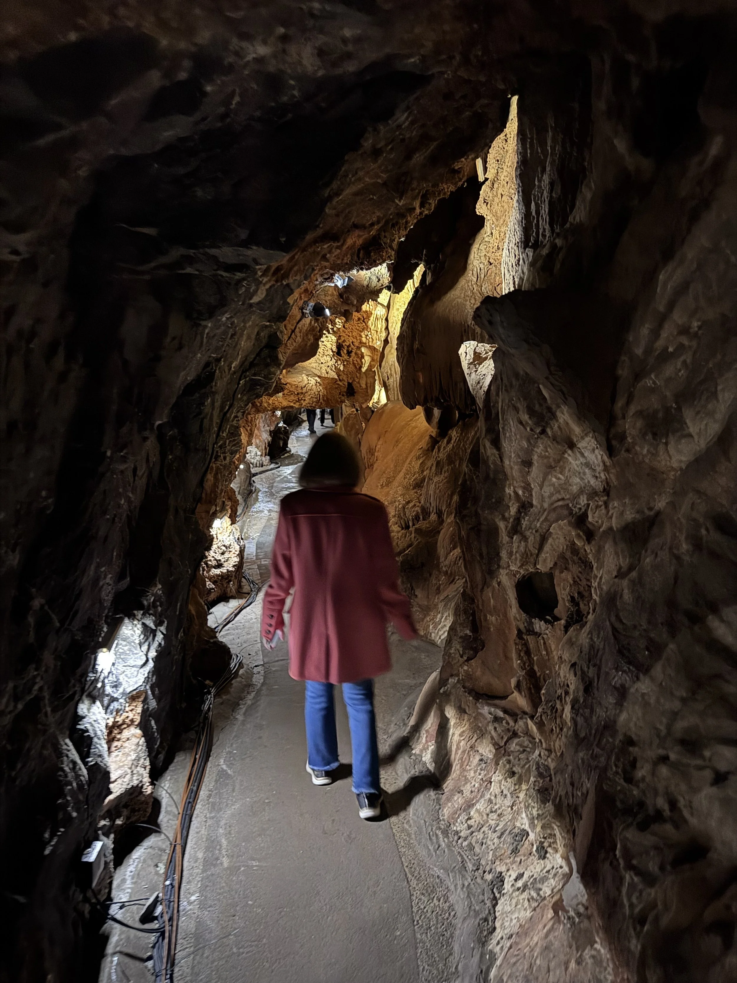 Leanne walking in cave.jpeg