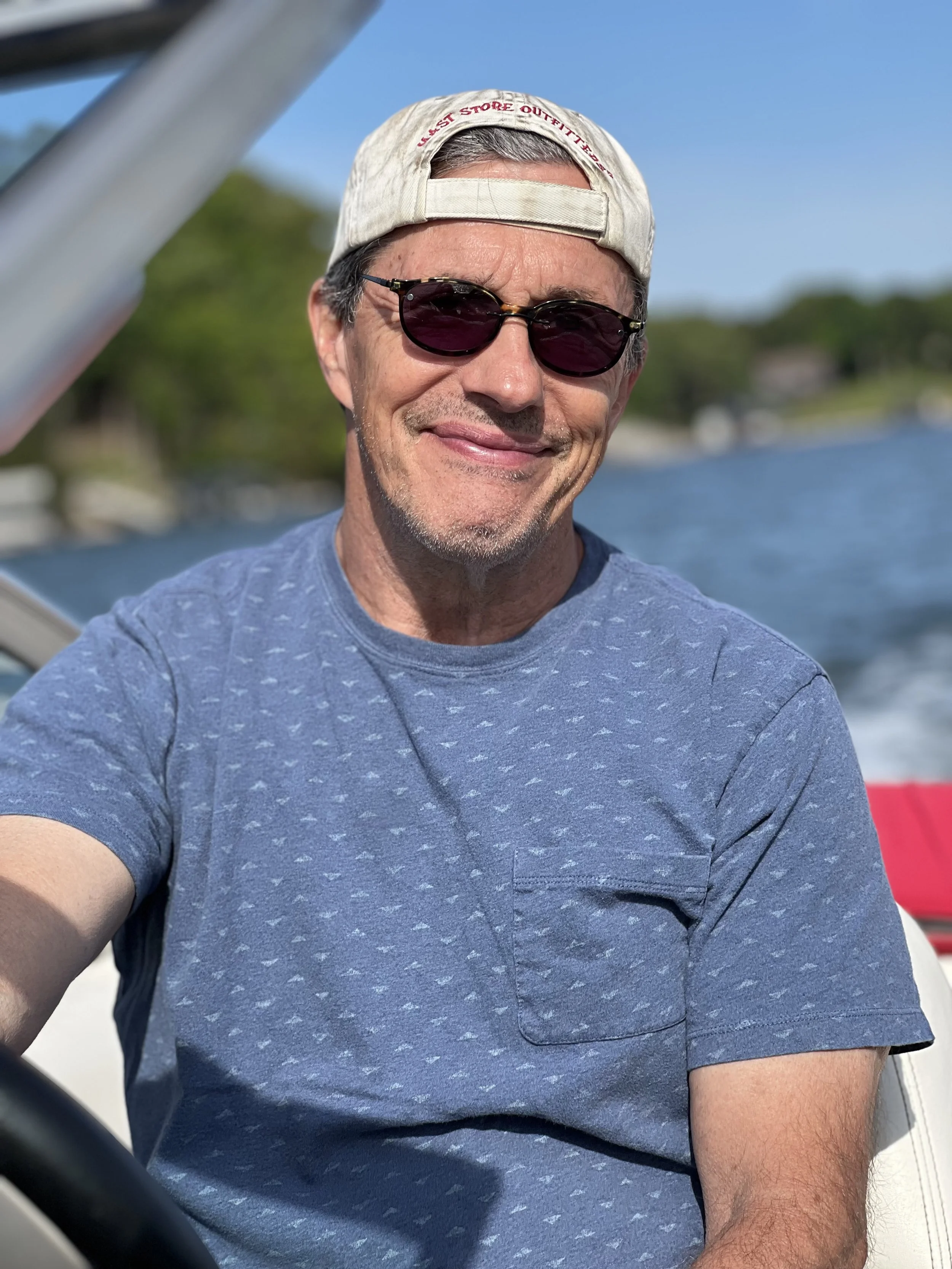 Timmy driving boat.jpeg