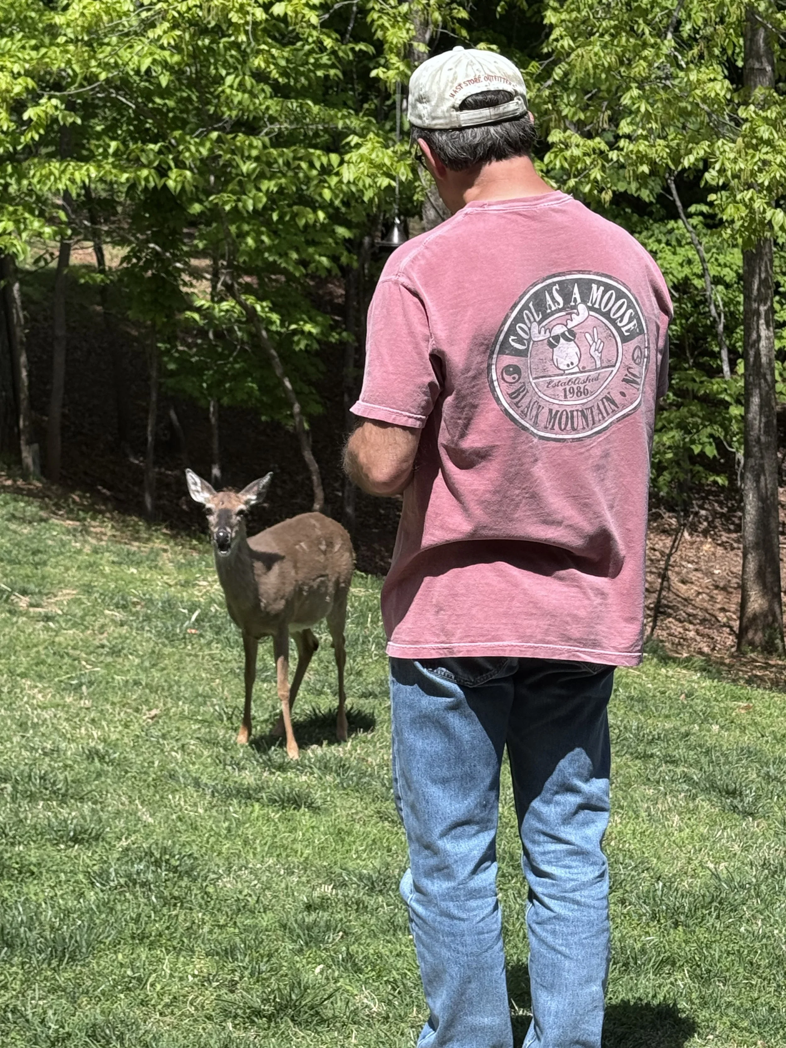 Timmy feeding deer.jpeg