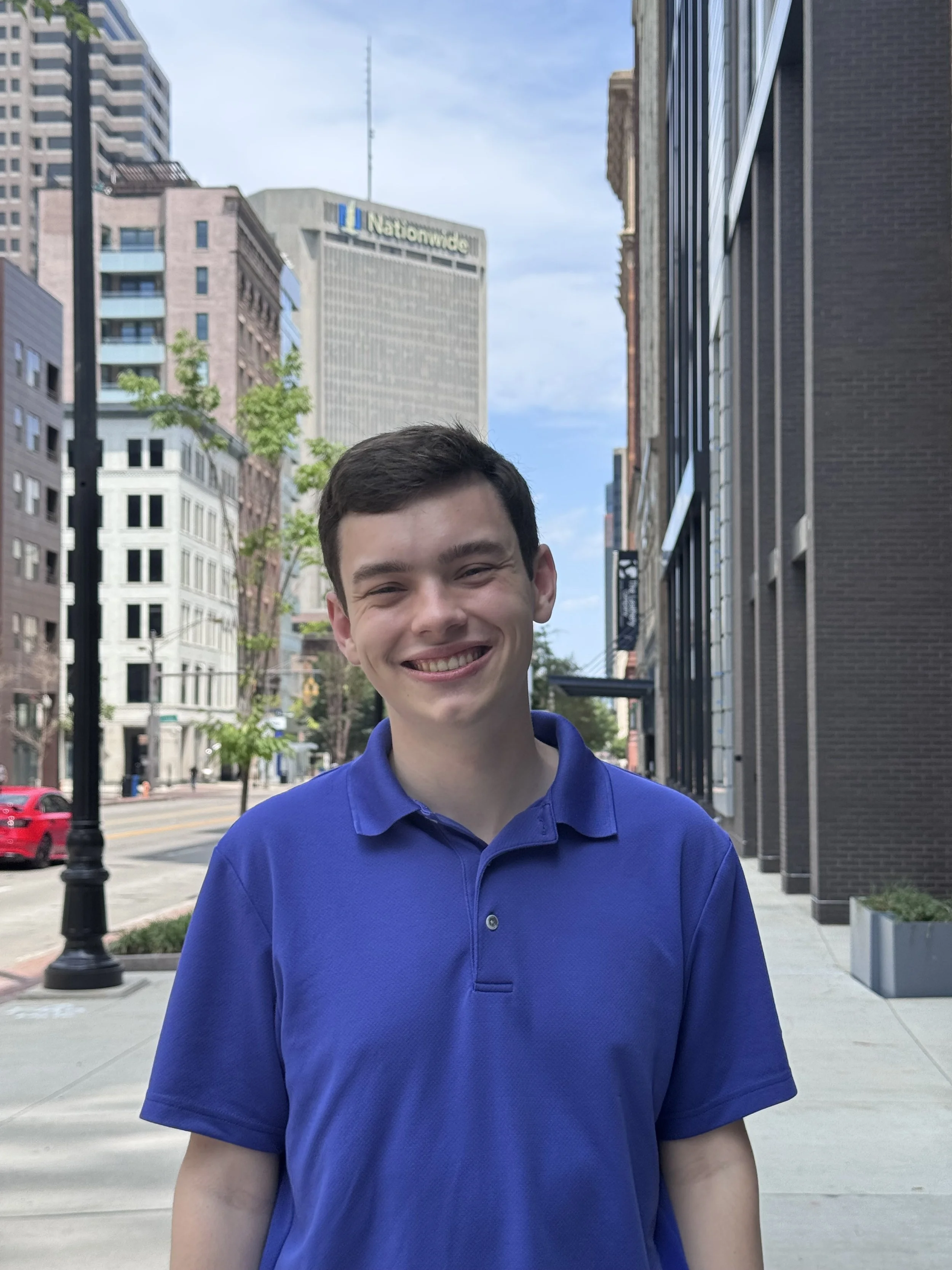 Matthew in front of Nationawide Building.jpeg