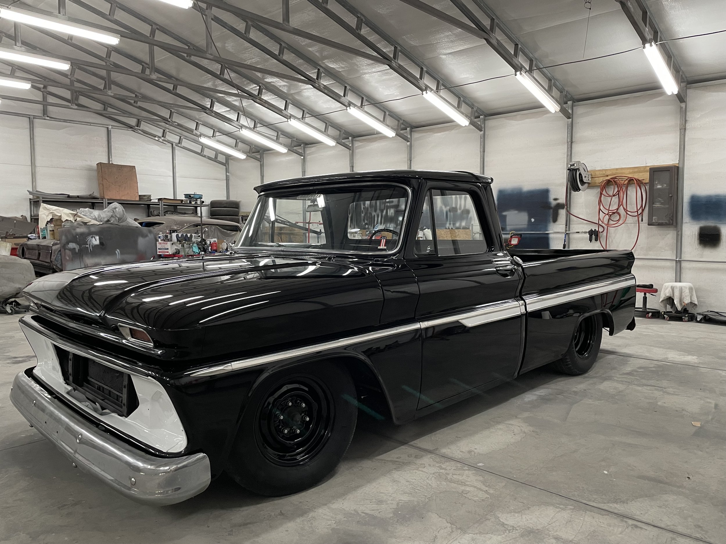 AFTER.
This '66 C10 received rust removal and metal repair, many rounds of body work and blocking, and fresh paint and clear.