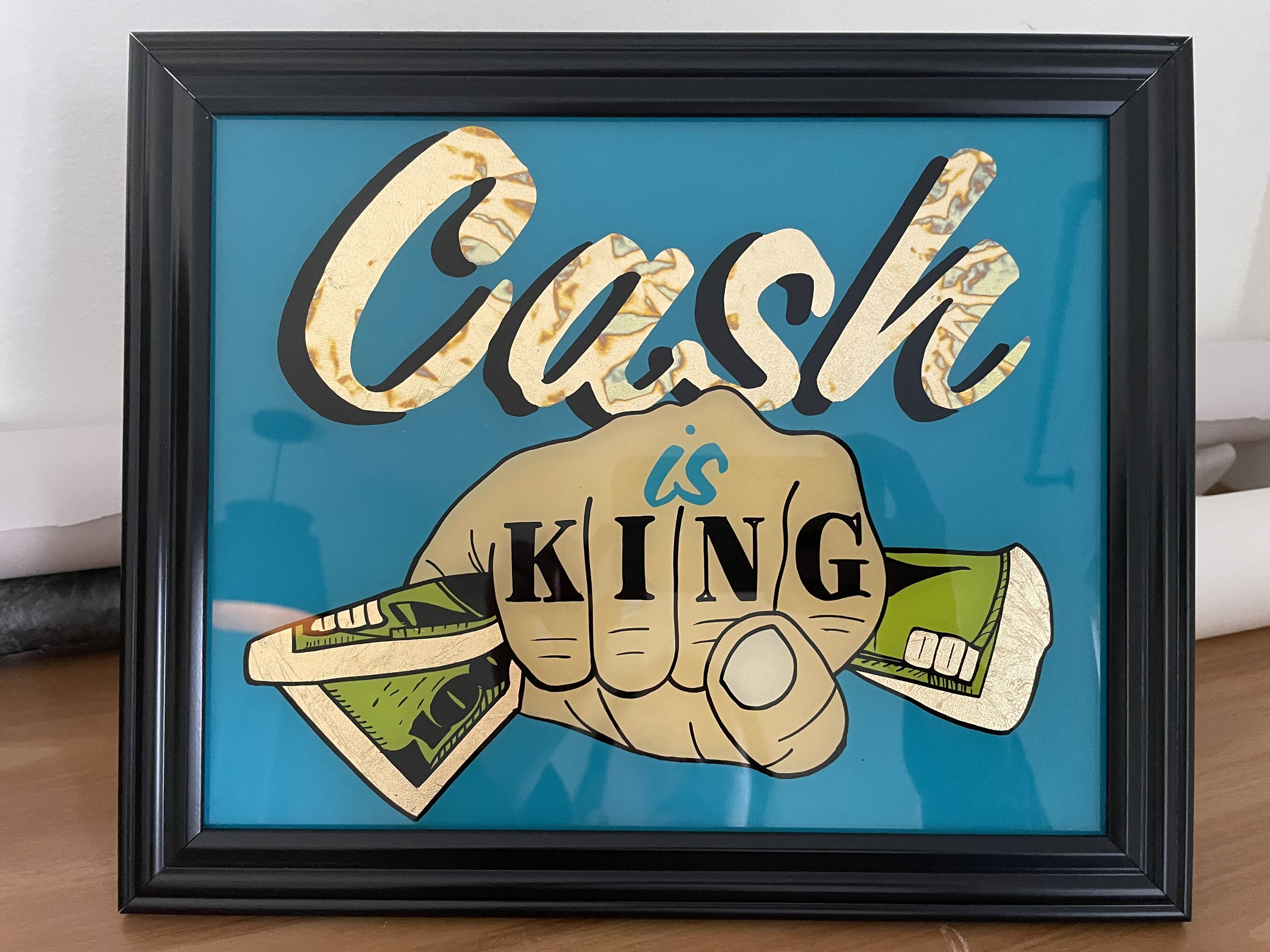 Reverse glass painting using 1 shot and variegated gold leaf. Blue background. 