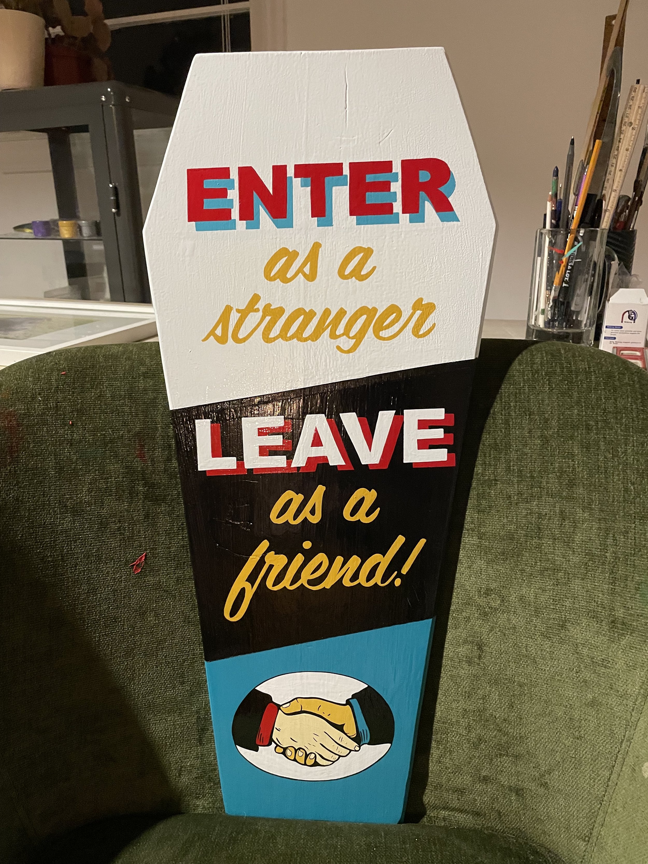 Handpainted wooden sign. 