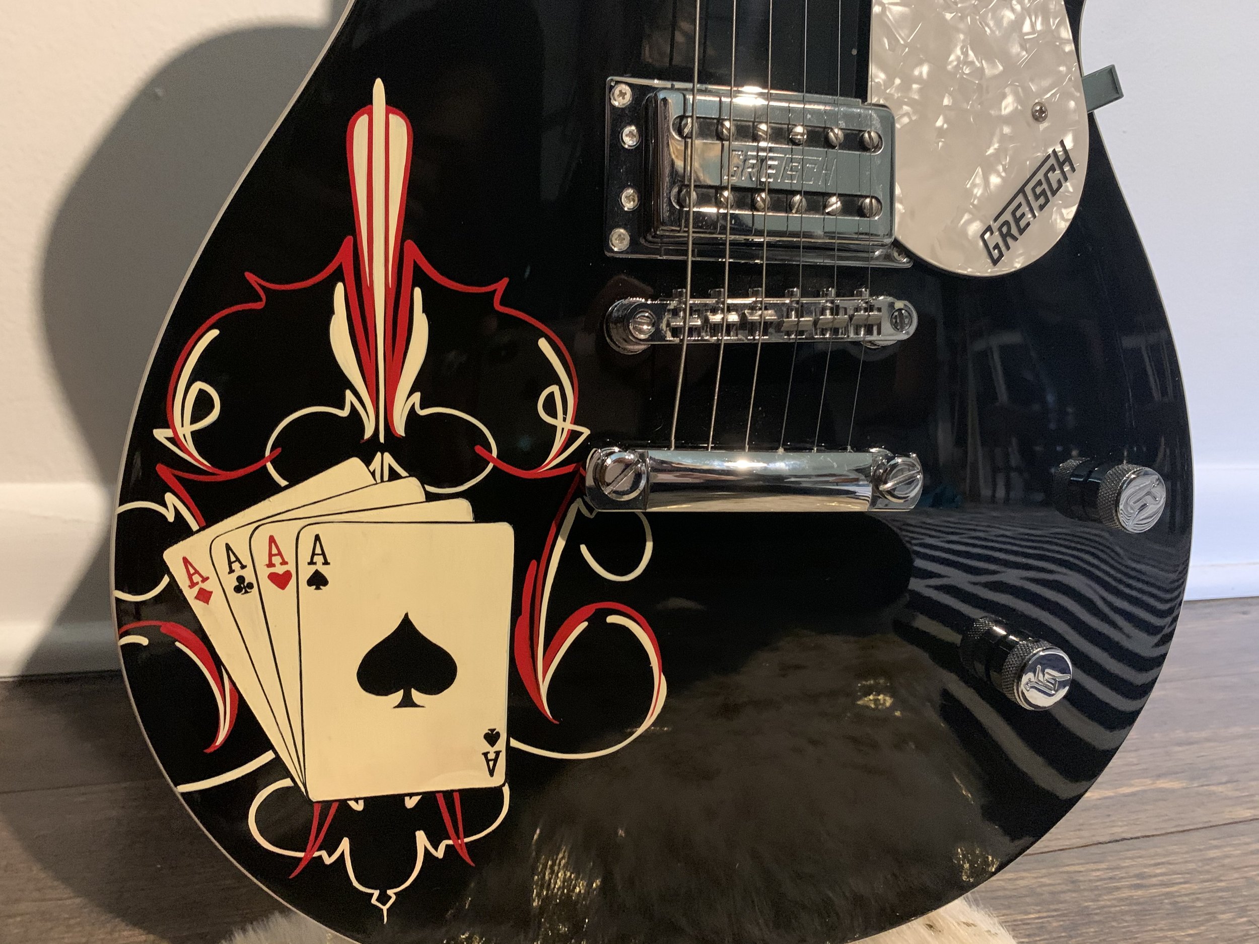 Pinstriping and graphics for guitar.