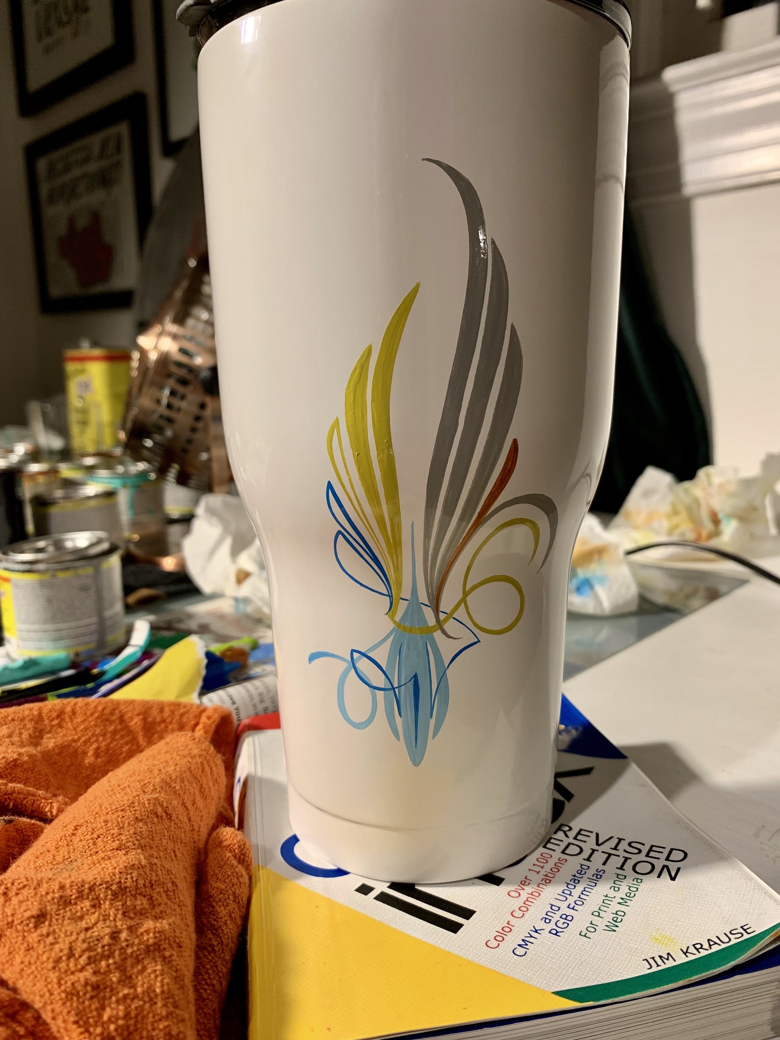 Pinstriping on tumbler. 