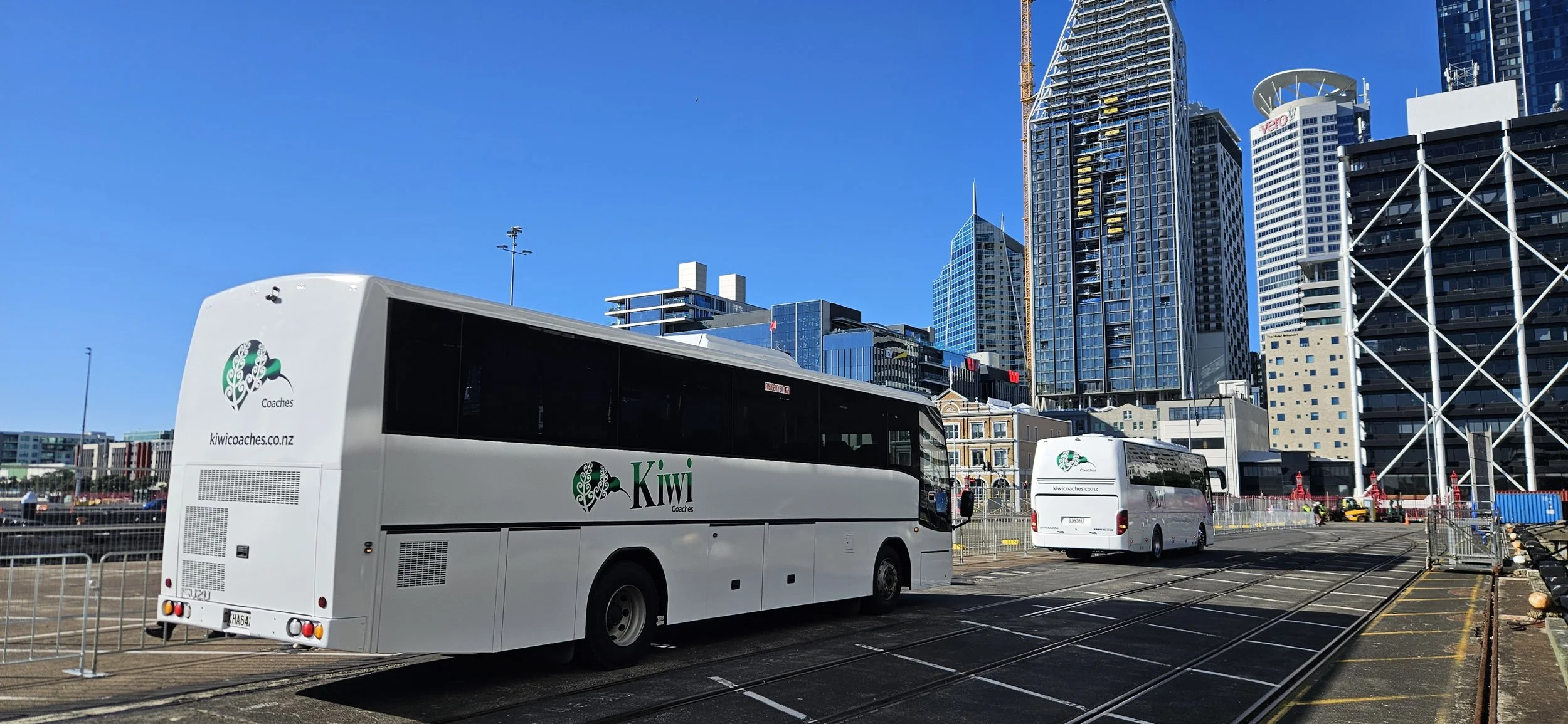 Executive coach hire Auckland with air conditioning, PA system and professional driver service.