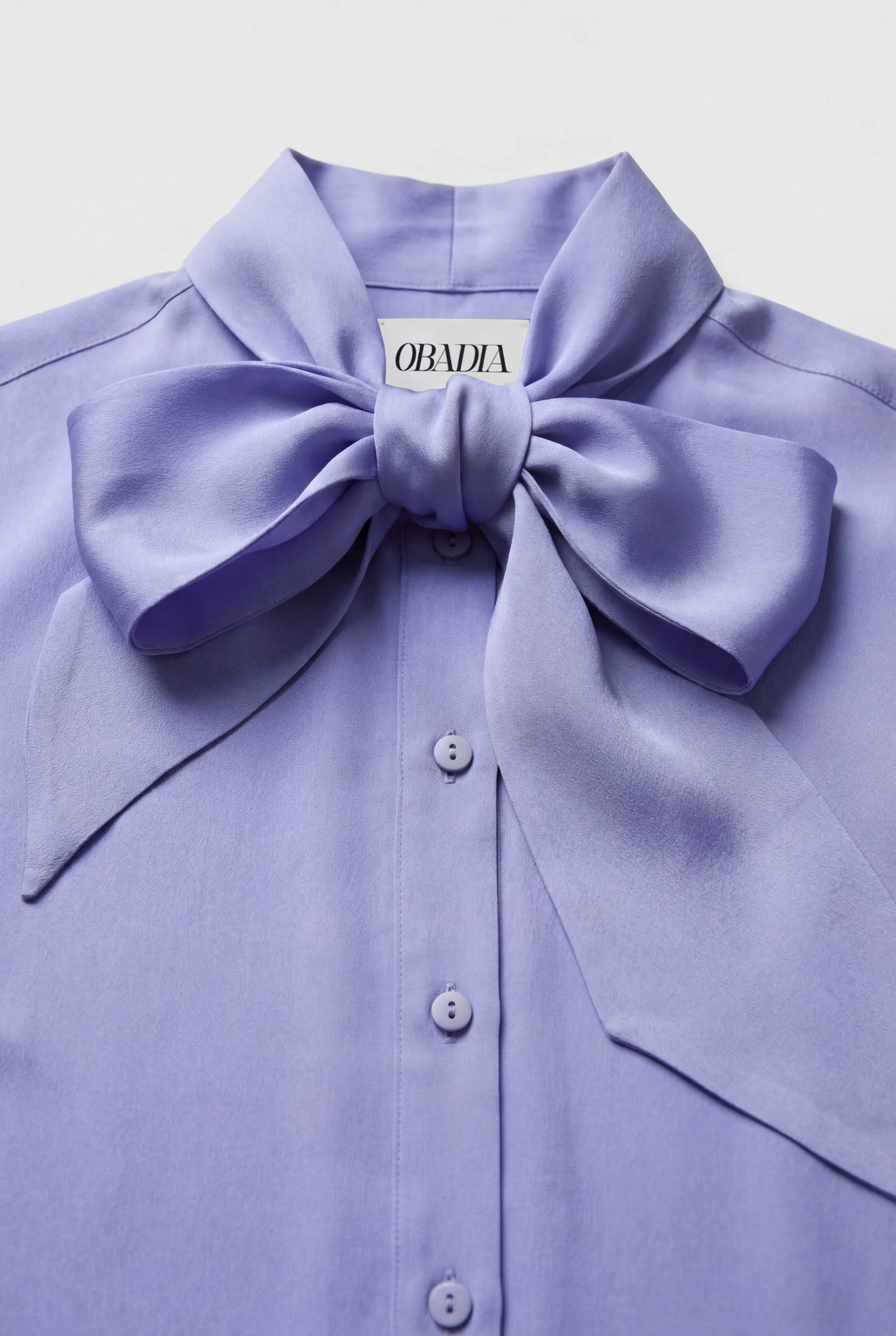 Detail of OBADIA Diane Shirt in lavender silk charmeuse with Lavallière neck tie
