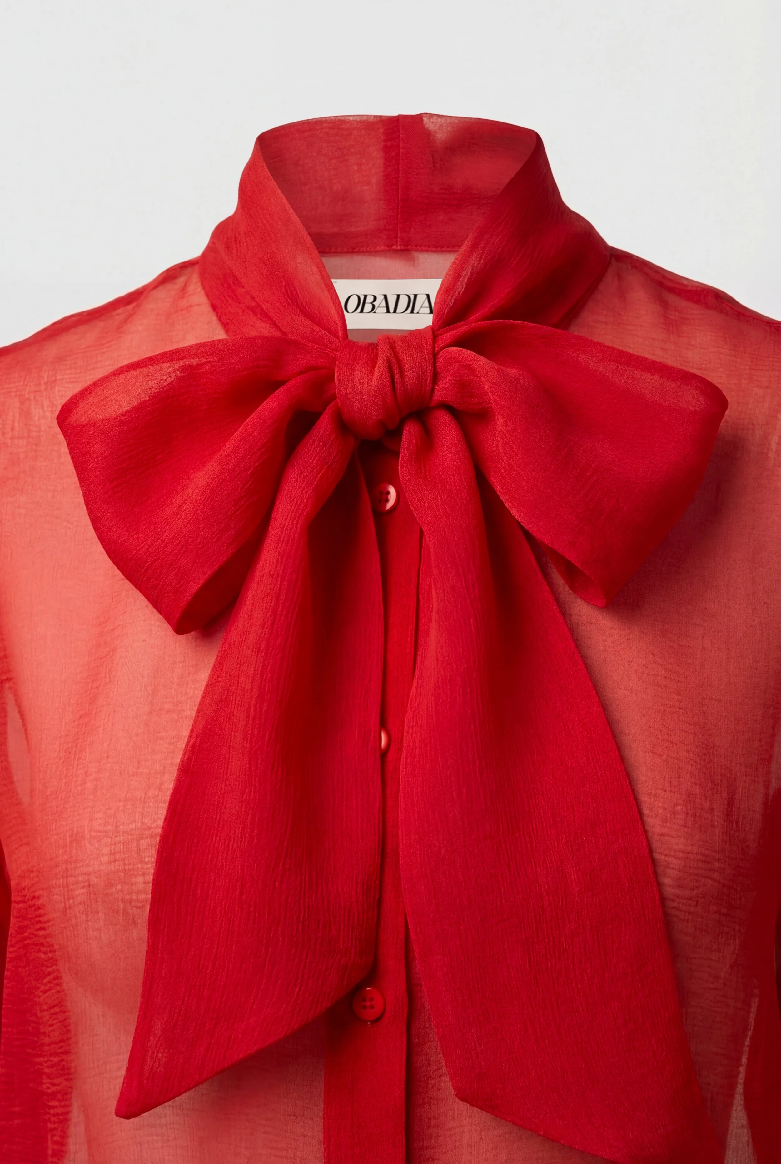 Detail of OBADIA Diane Shirt in red silk mousseline with Lavallière neck tie.jpg
