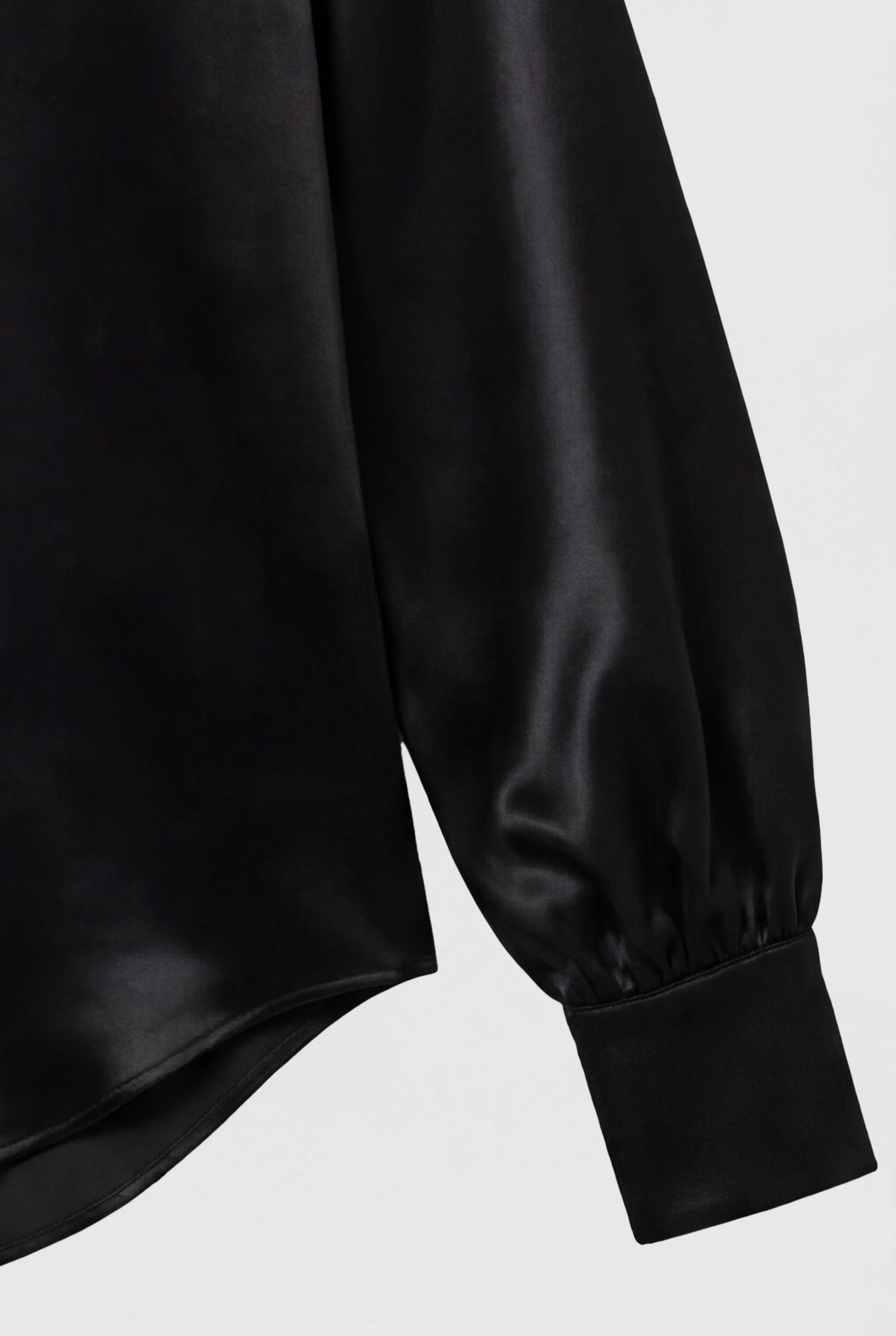 Detail of OBADIA Diane Shirt in black satin with Lavallière neck tie