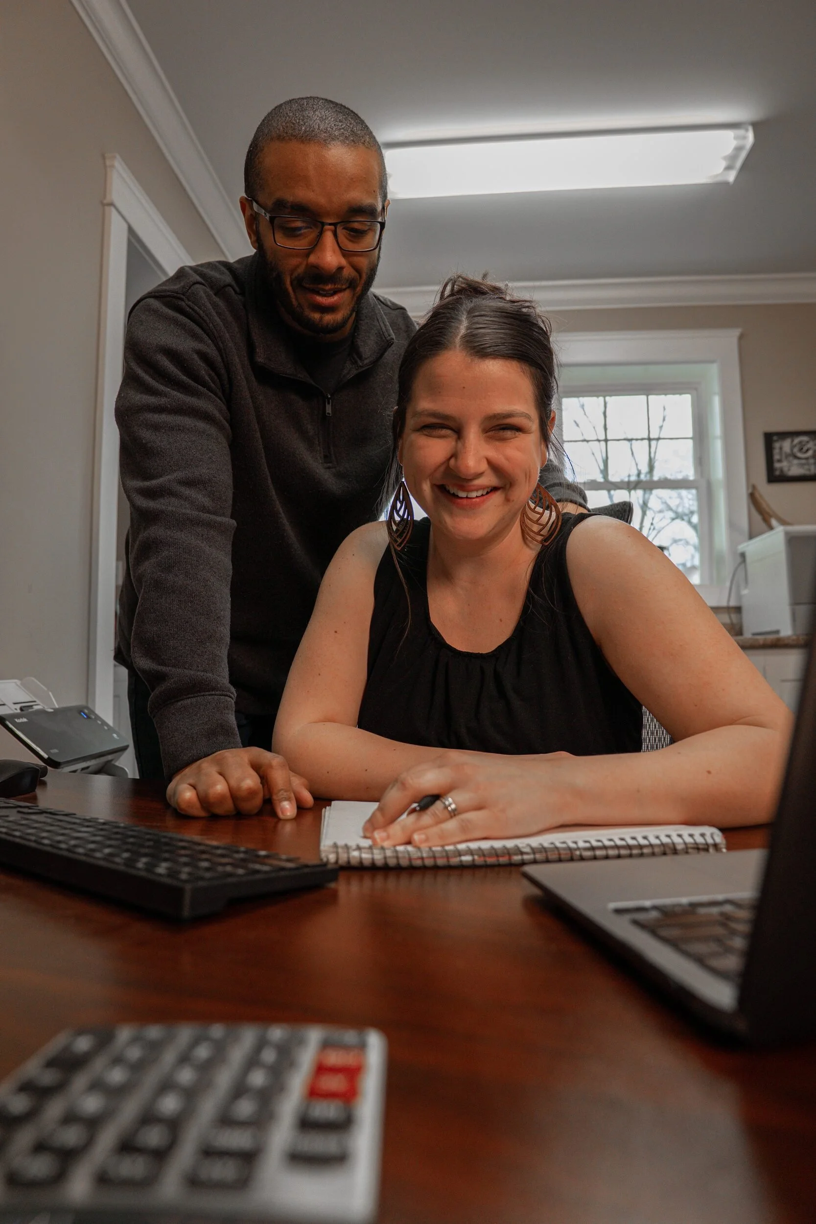 Desmond and Siena Haskell collaborating on an e-commerce website project.