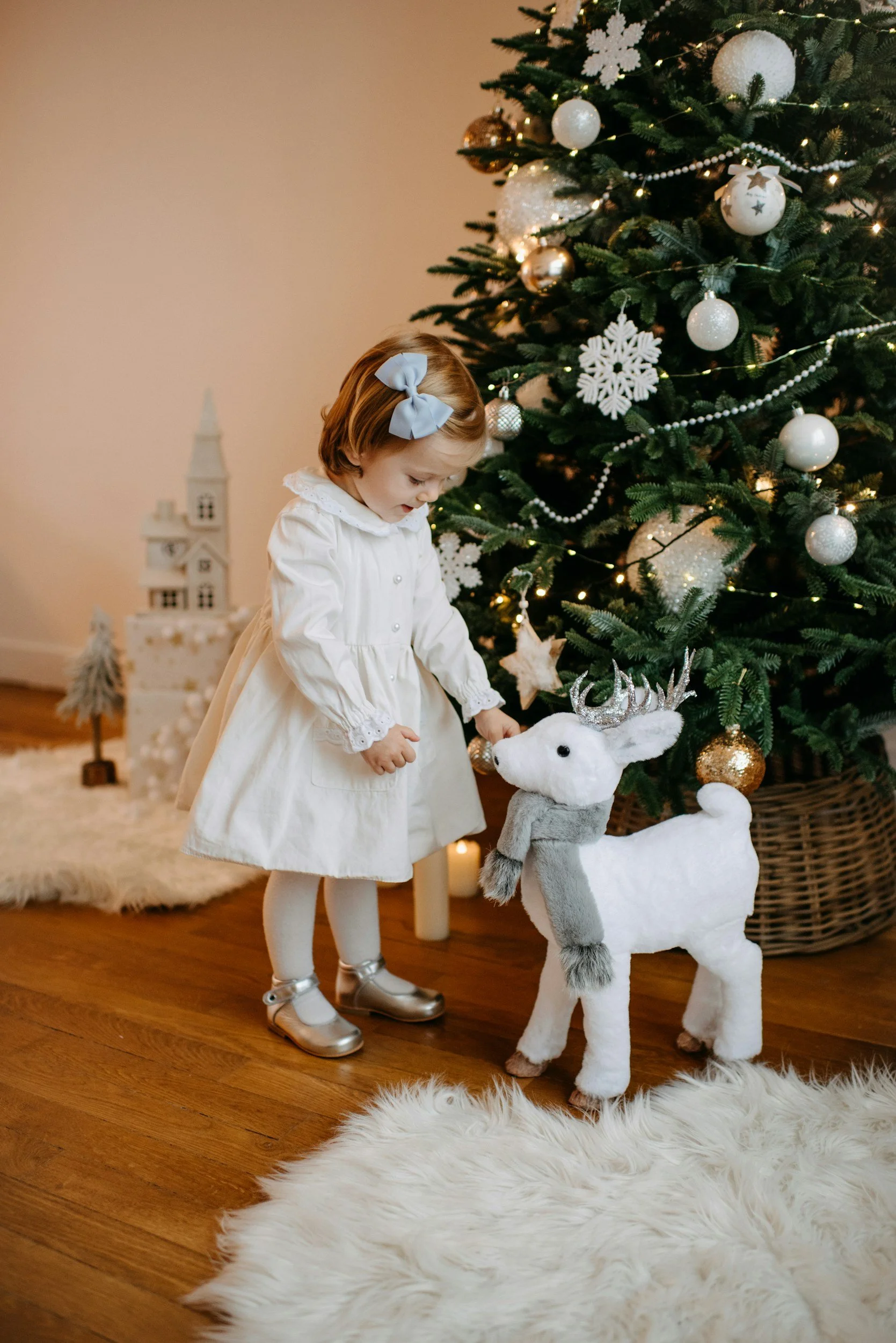 little girl christmas tree lights