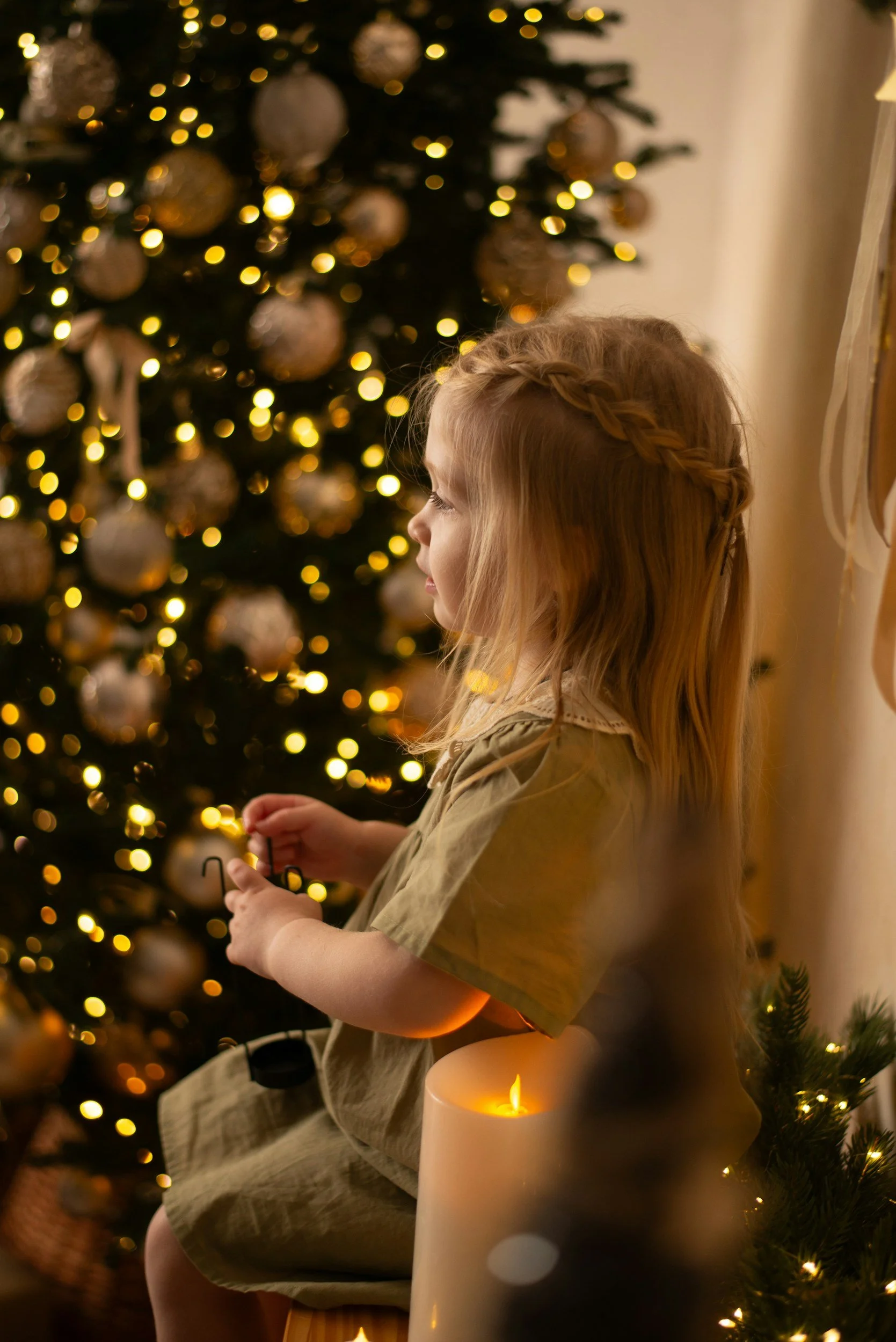 girl at Christmas tree