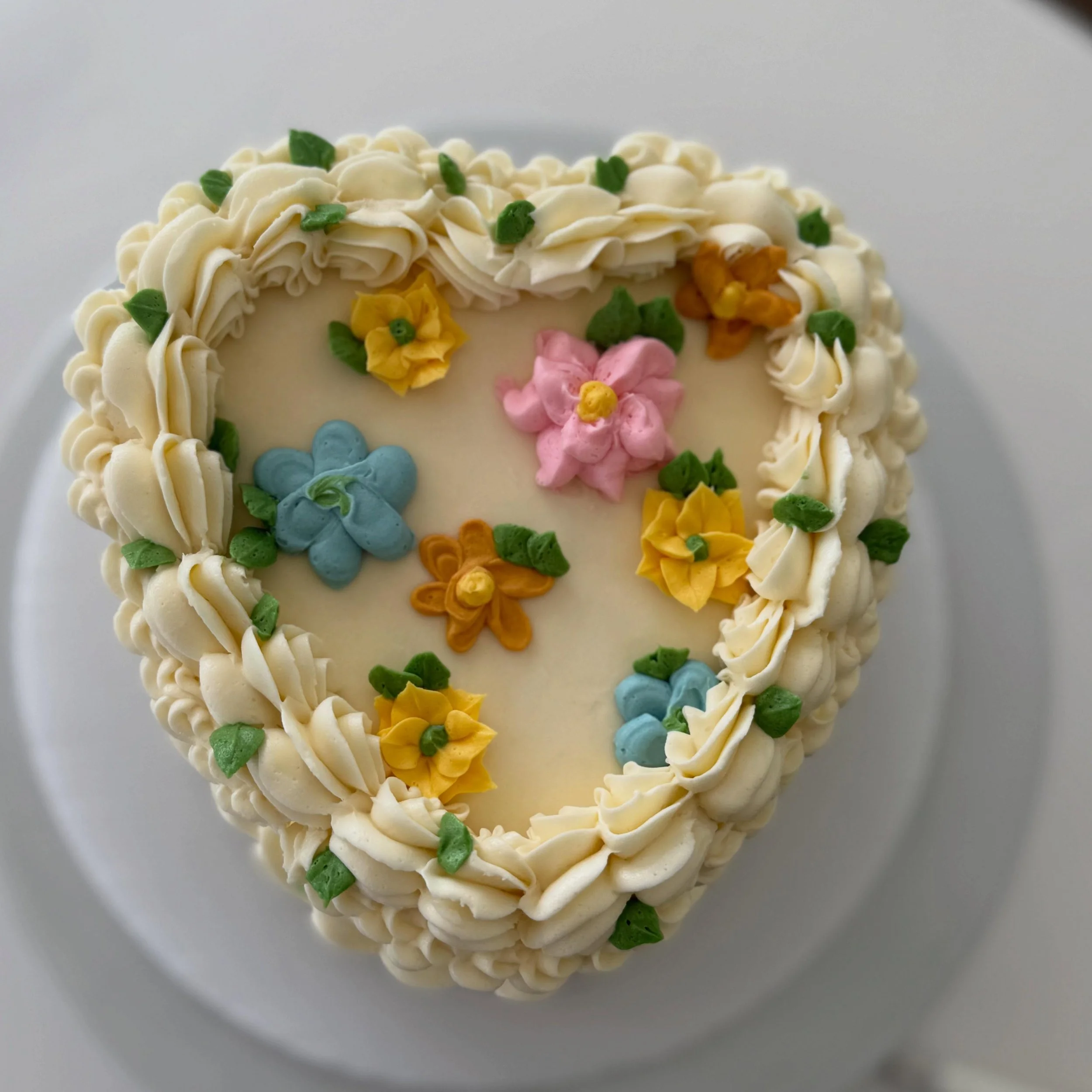 Close up of last weekends wedding! #heartshapedcake #stonegardennh #weddingcake #localbakery #gardenwedding