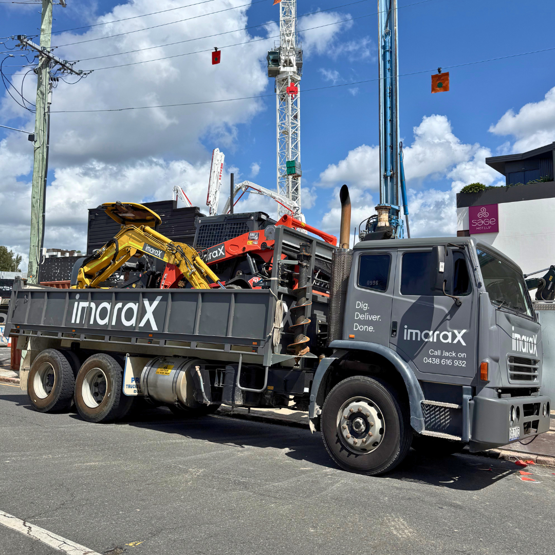 imaraX truck with excavator and skid steer in the tray