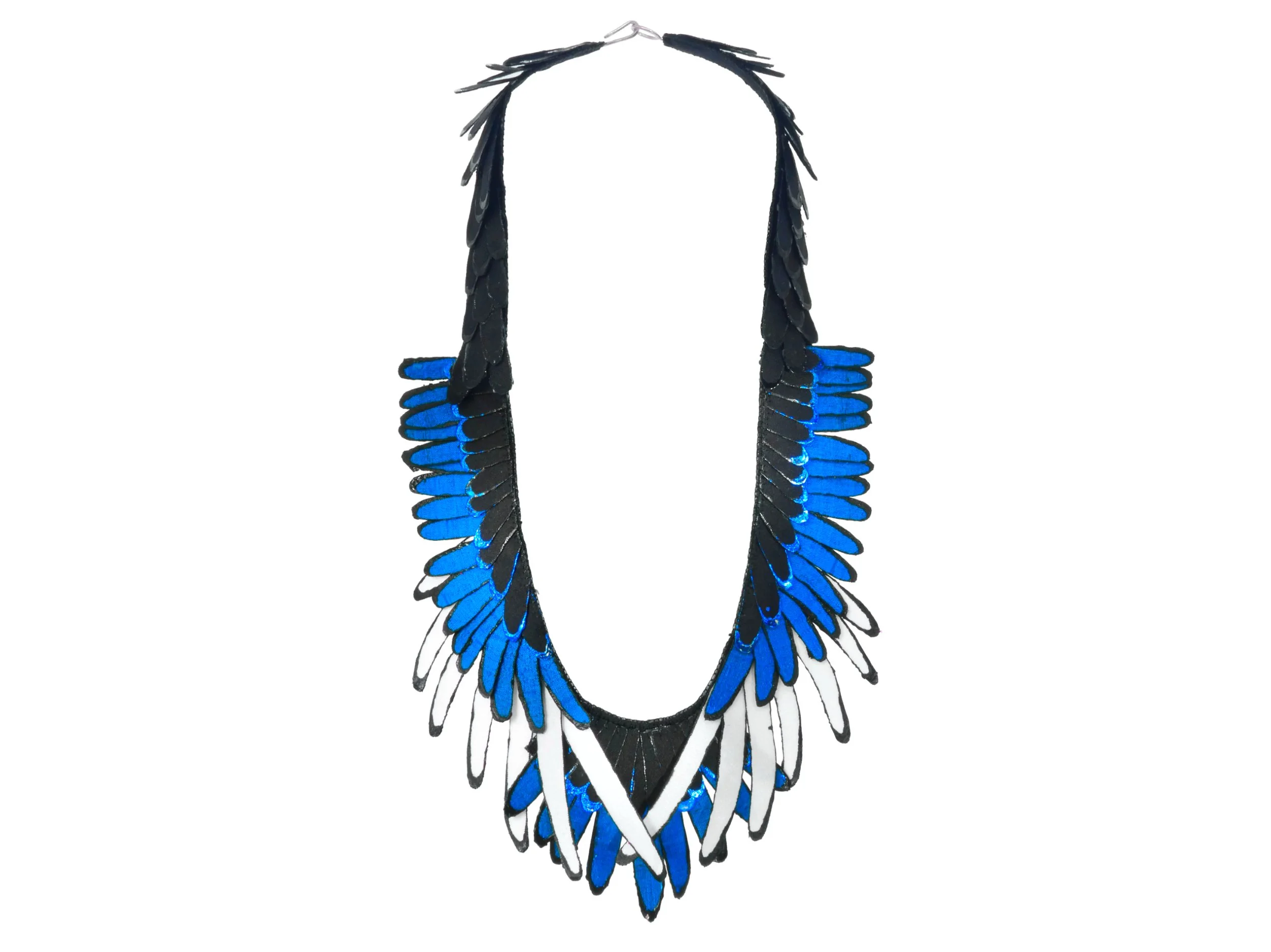 Pica: silk, metallic leaf, acrylic and silver clasp