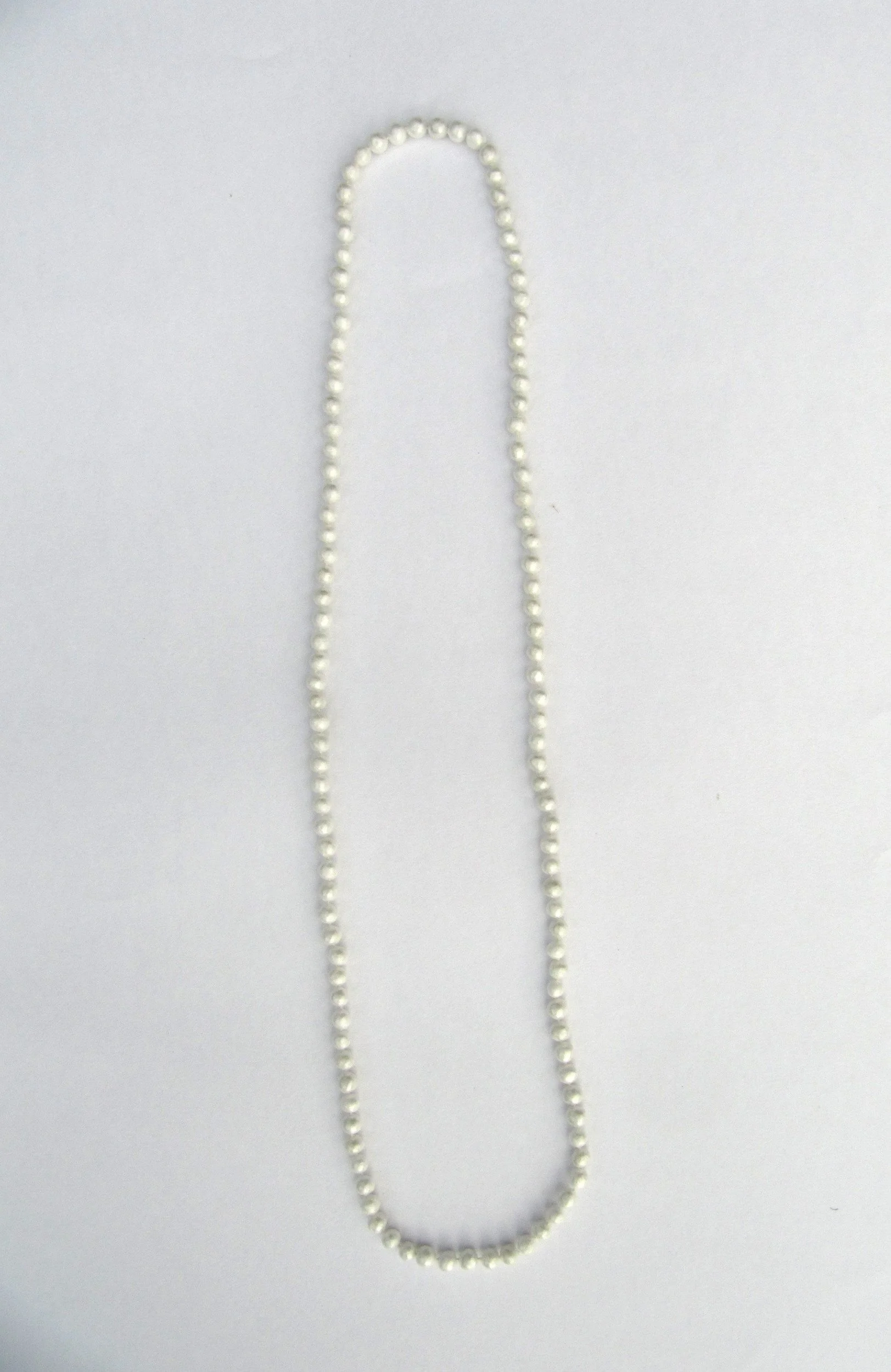 cling_film_sautoir_petites_perles.jpg