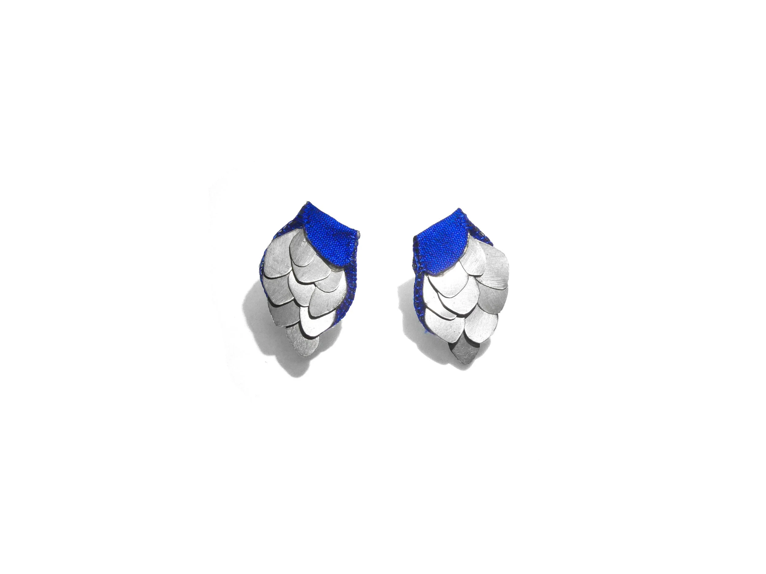 Contemporary silver and silk earrings handmade in Switzerland, reflective elements on raw silk inspired by blooming flowers