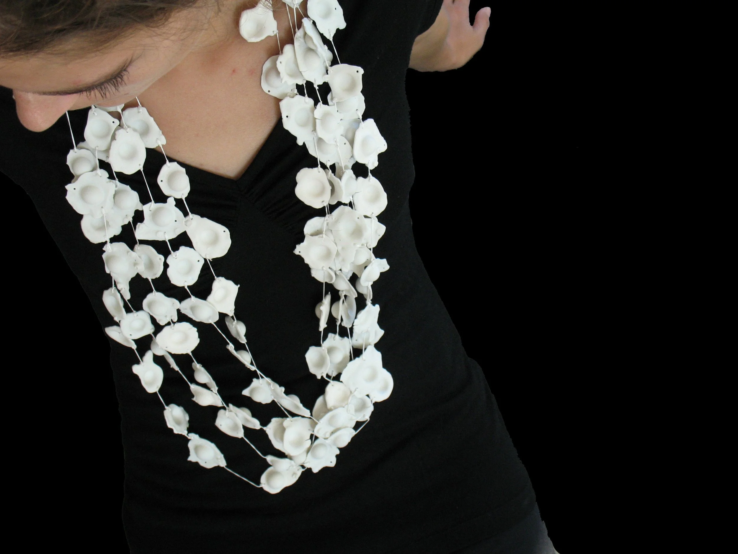 Ravioles, porcelain and silk thread