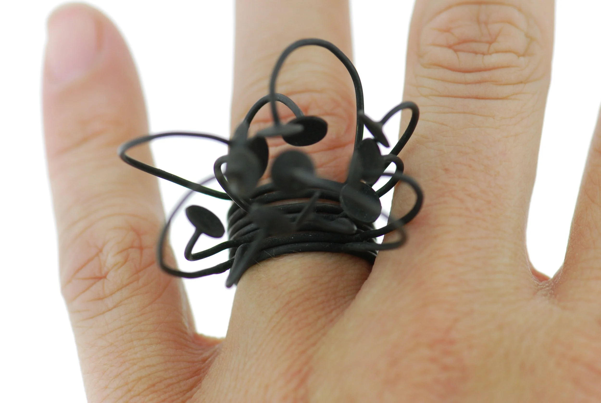 Oxidised copper ring and marble
