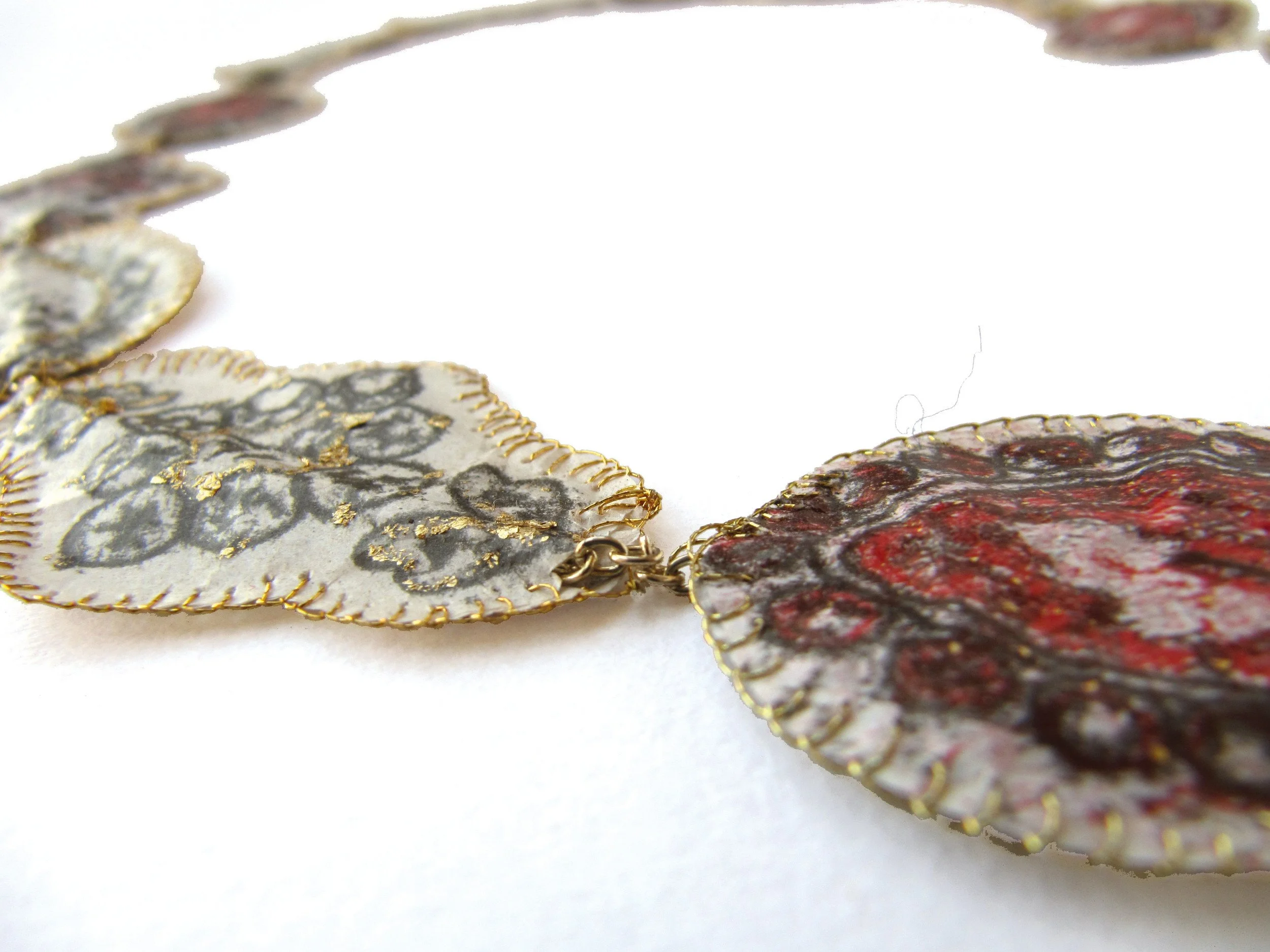 monoprint and gold leaf on necklace