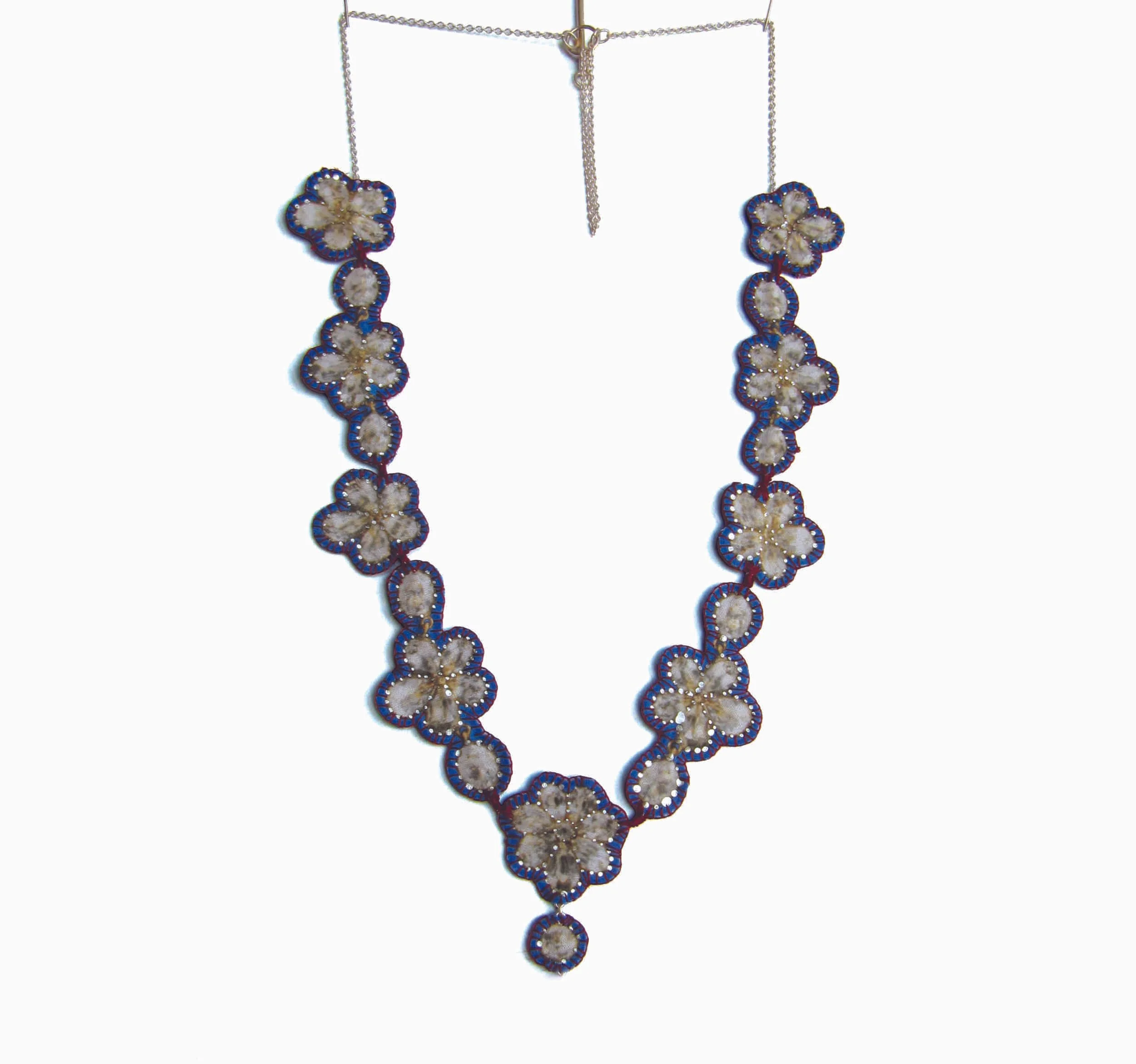 Romantica: Printed silk, silver leaf, silver chain