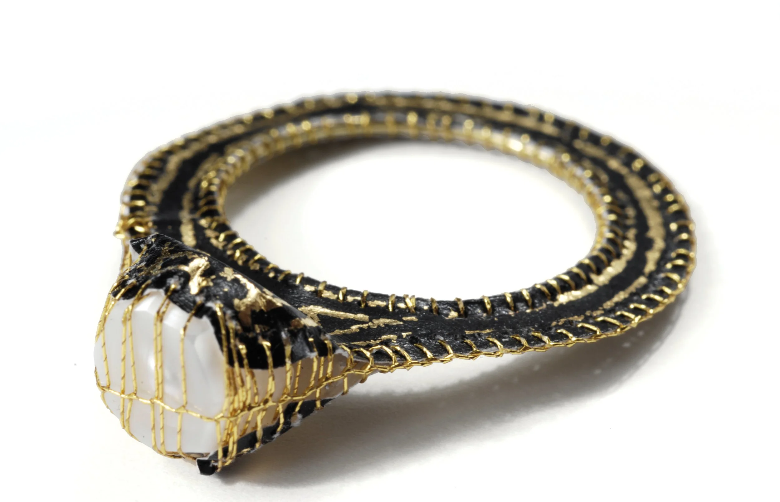 Getting to the Gold-Paper: 18k gold, gold leaf on paper, carved pearl