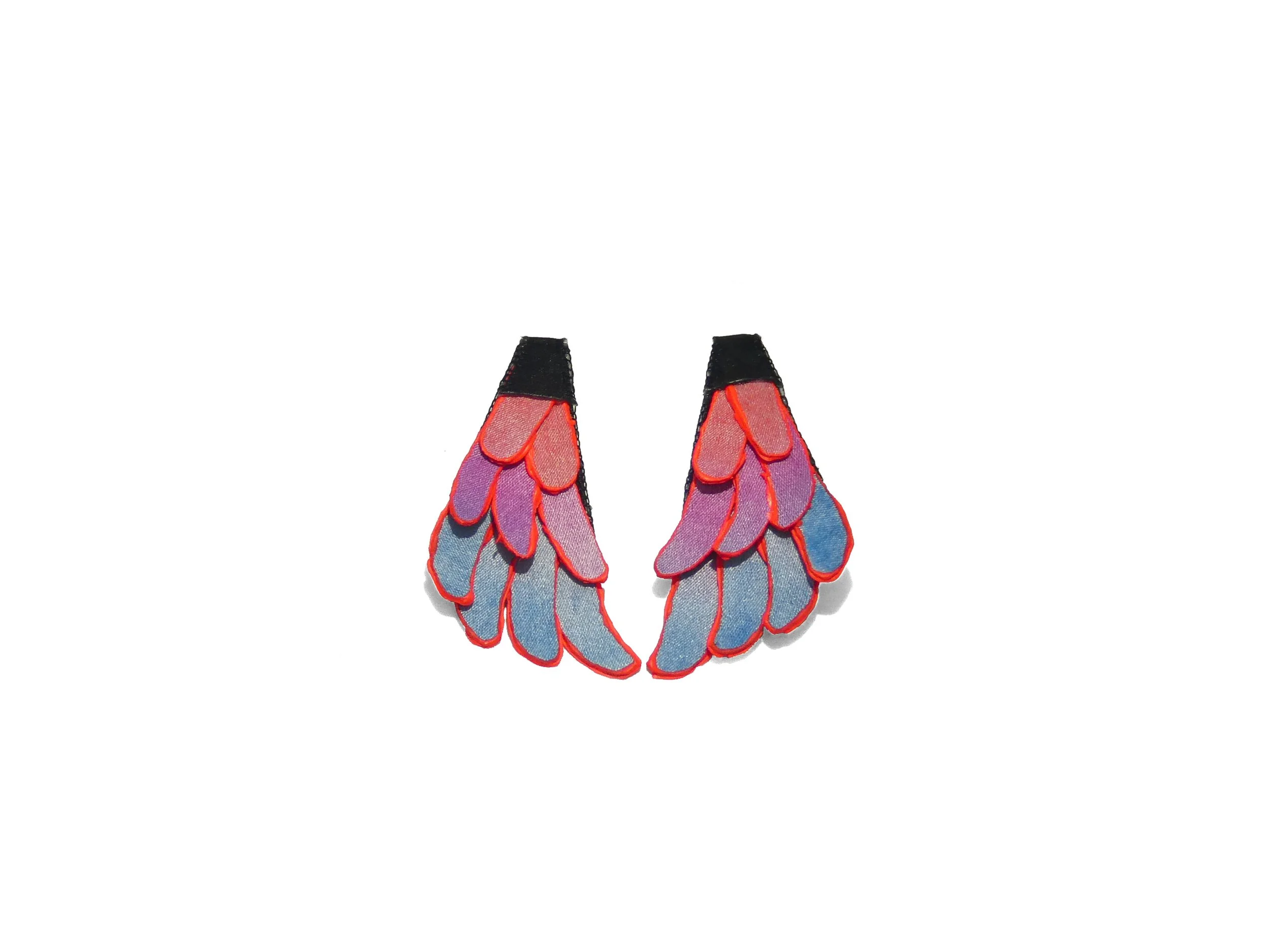 Art jewelry piece by Julie Usel, iridescent pink and blue tones, handmade in Switzerland