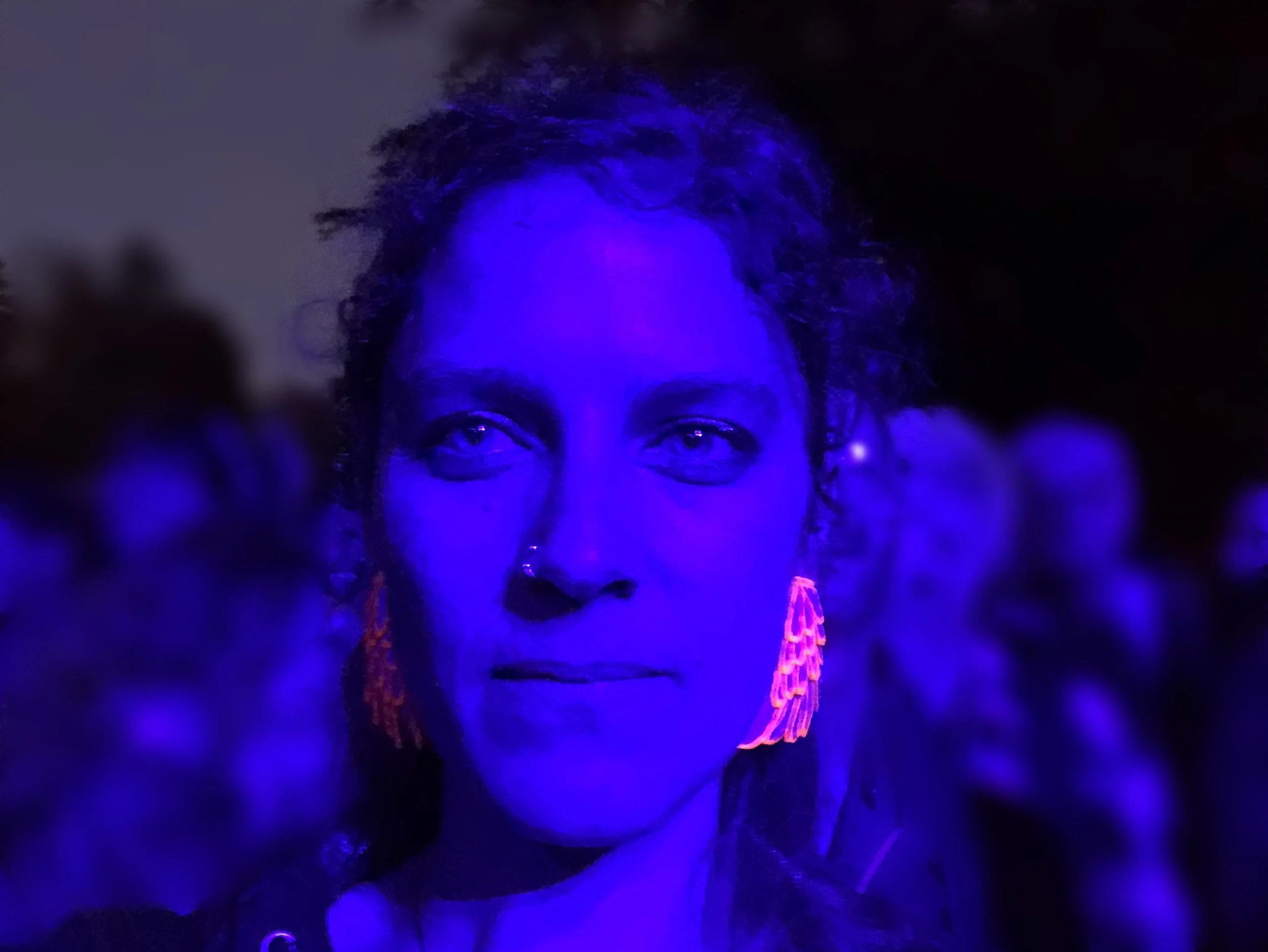 Art jewelry piece by Julie Usel, iridescent pink and blue tones, handmade in Switzerland