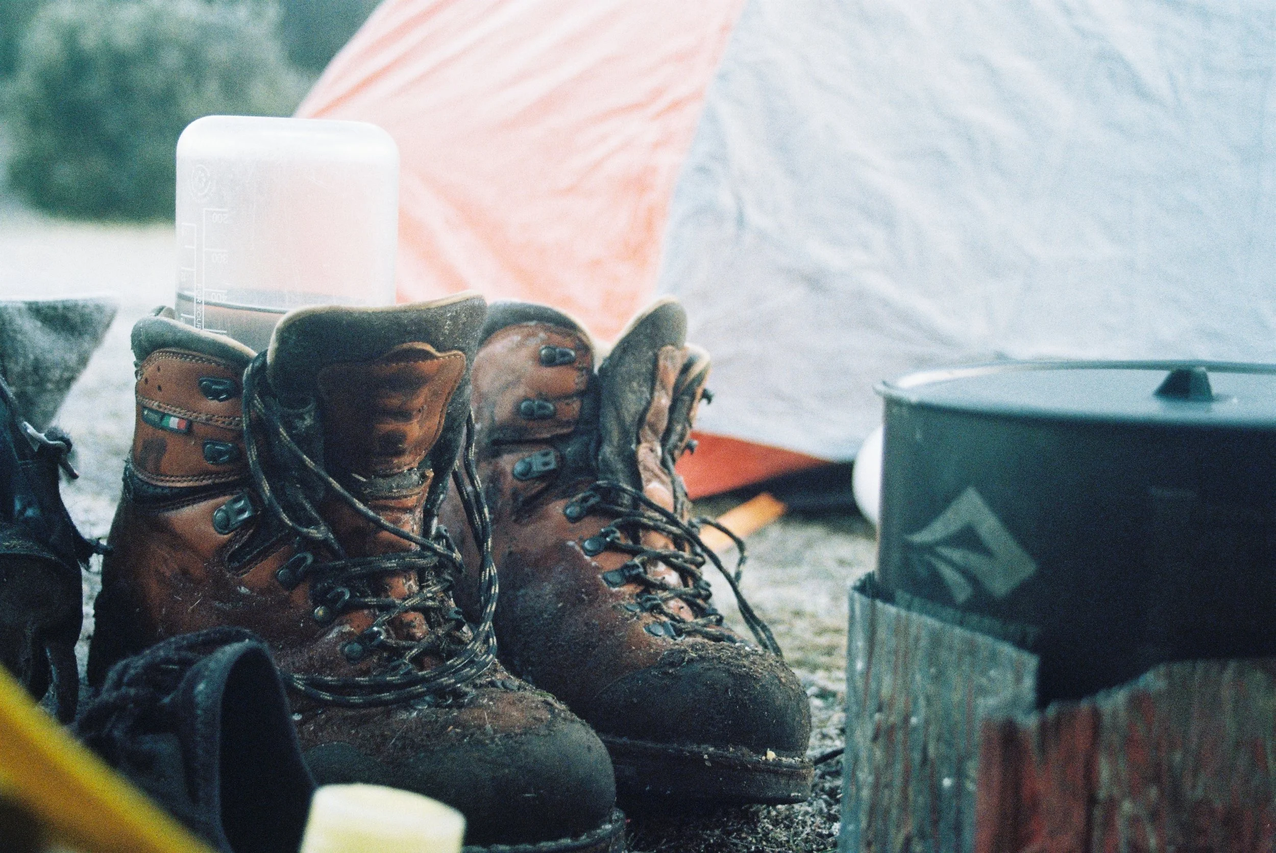 muddy, frozen hiking boots