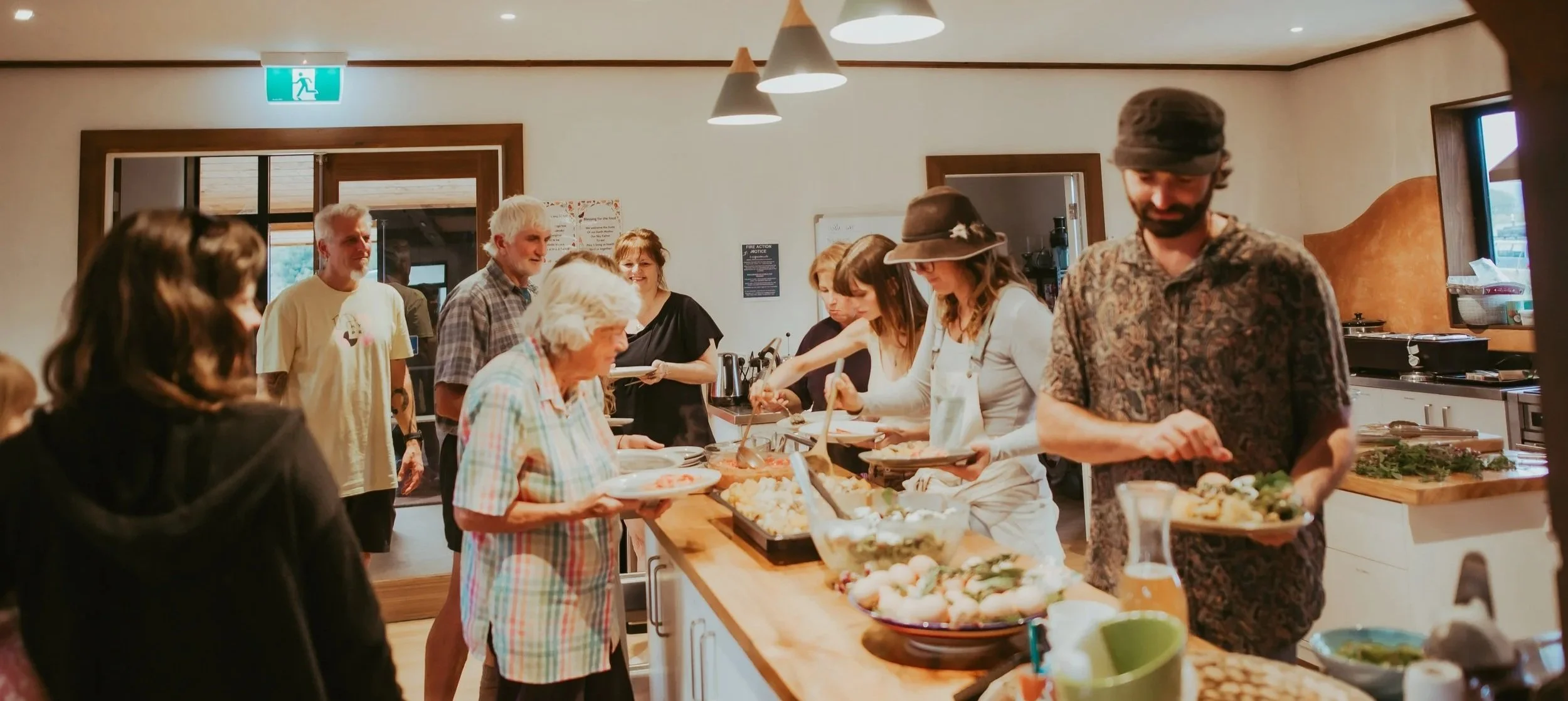 Community connection - the timeless act of sharing food brings people together, enhancing wellbeing for all. (1).jpg