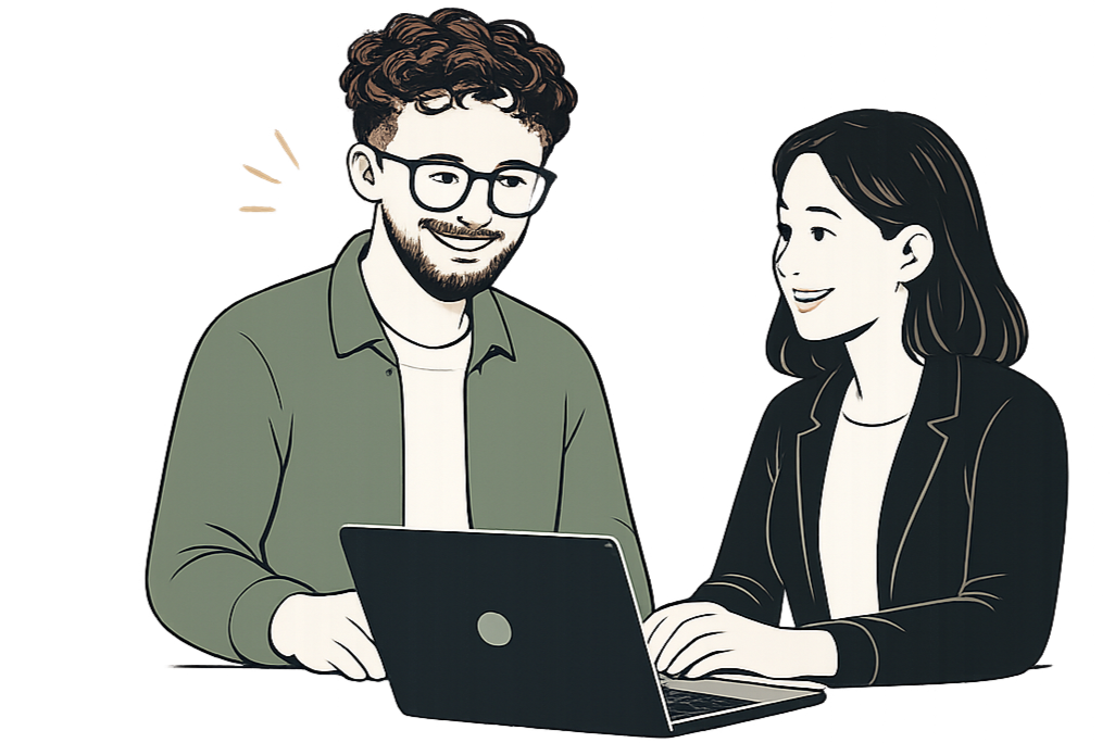 A man and woman sitting at a table, looking at a laptop and smiling, engaged in a conversation.