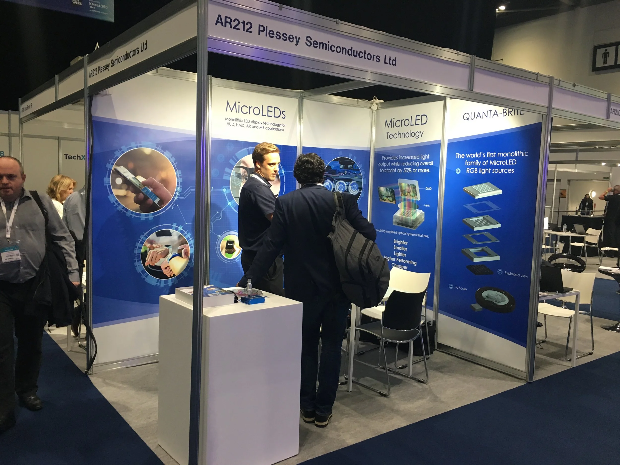 AR & VR World stand image with Vuzix employee.jpeg