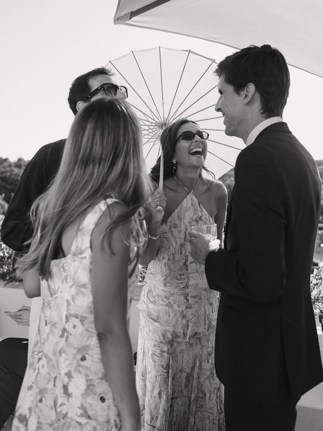 A cocktail under umbrellas