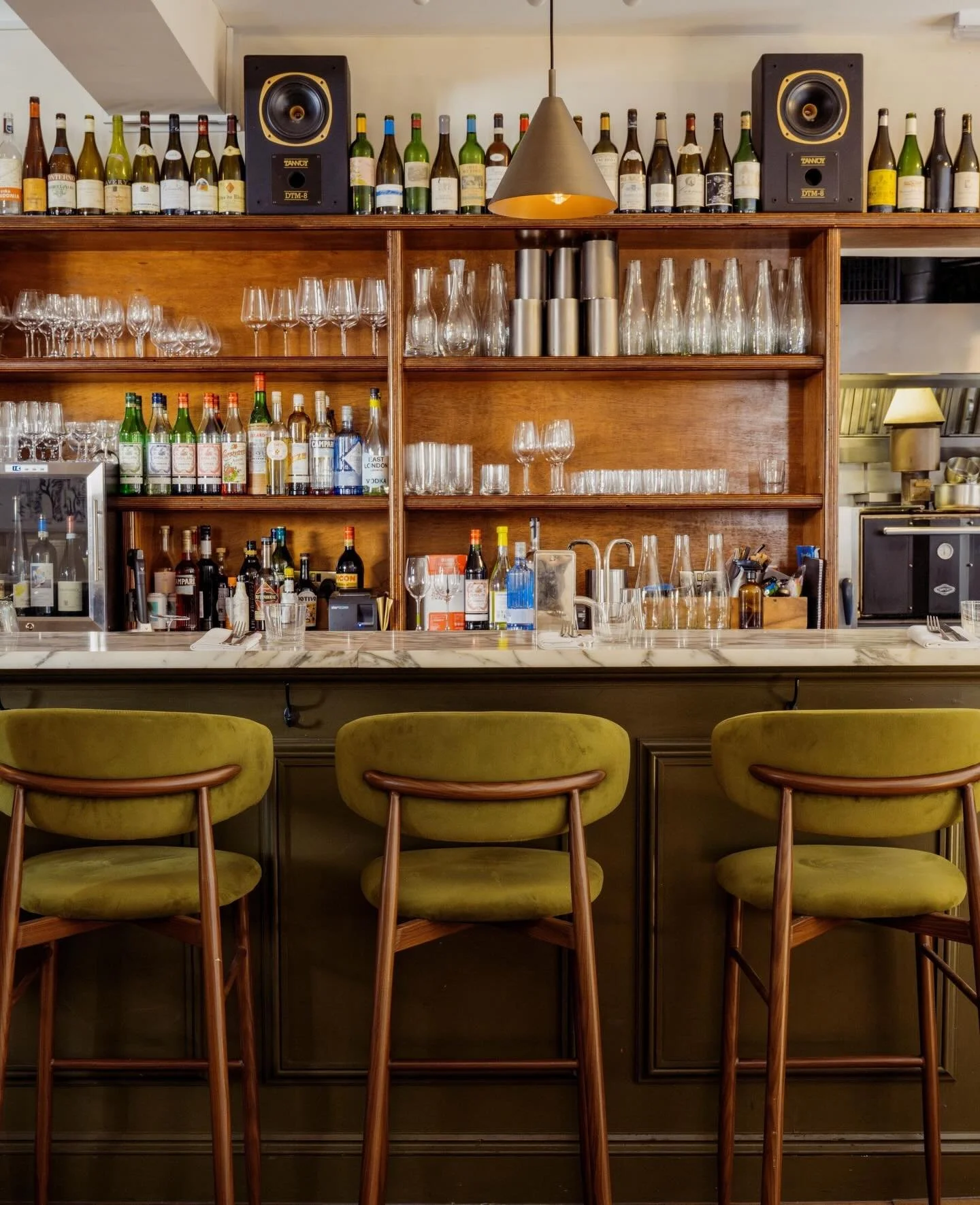 The bar is our favourite seat in the house. You get front-row views of the chefs, a peek at what&rsquo;s landing on the pass, and you might even be able to put in a request for a specific record from our collection. ⁠@amyheycockphoto
#eastlondonfood 