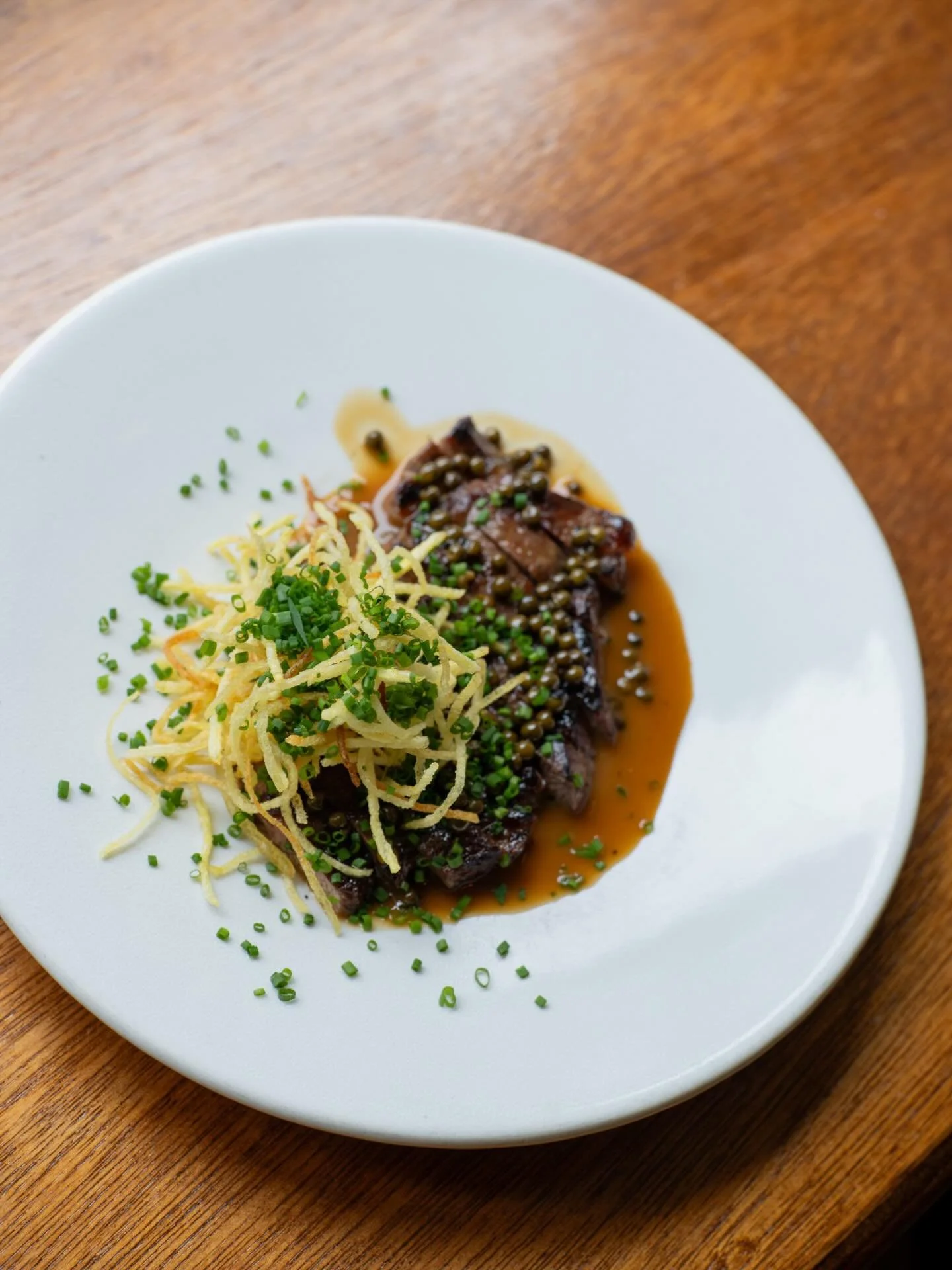 All this week, grilled bavette steaks, cooked over coal and juniper from @lake_district_farmers on for &pound;20 with some shoestring fries and some spicy cafe de Paris butter. Amazing quality, super good value!