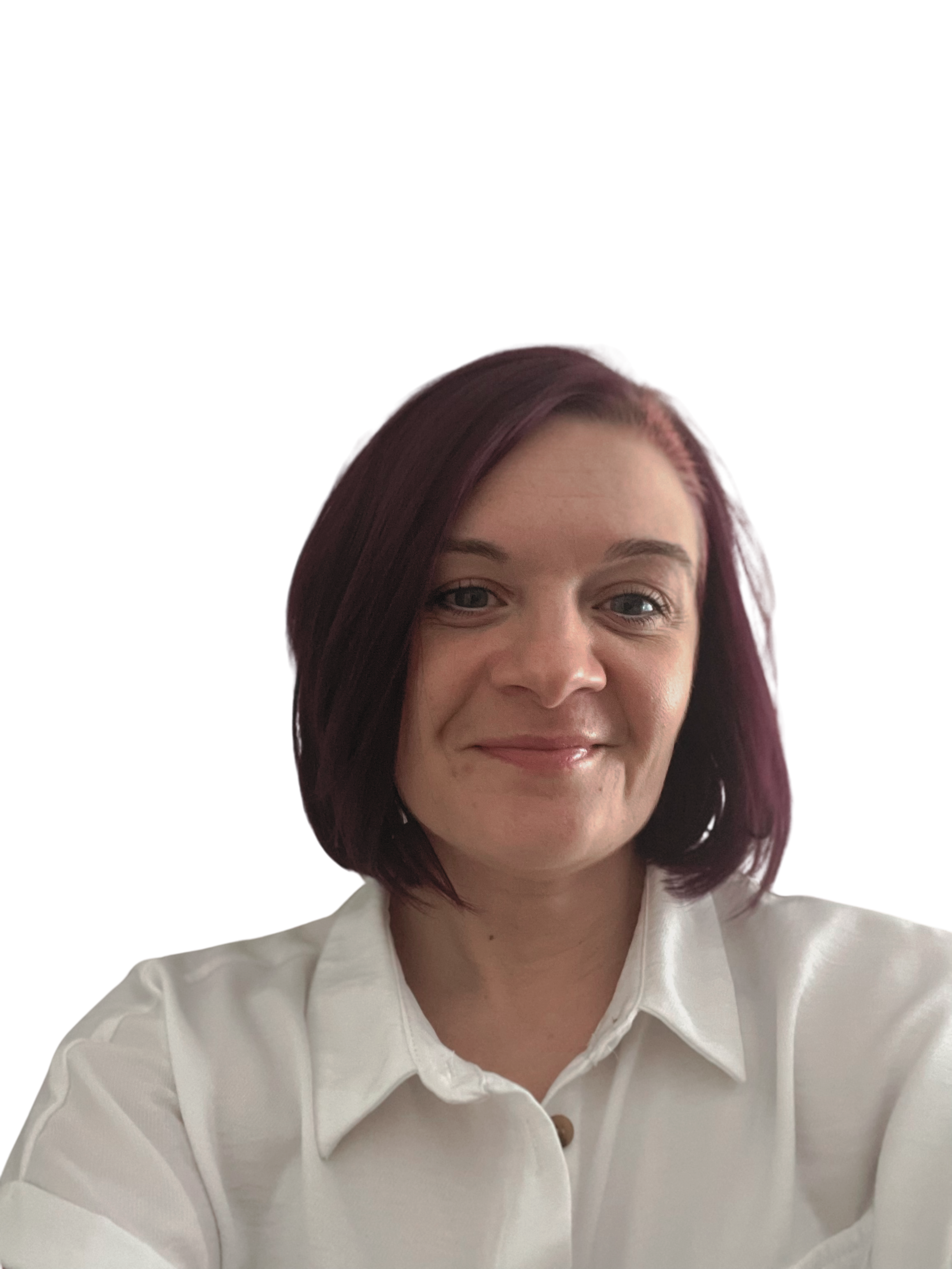 Person smiling, wearing a white shirt, black background